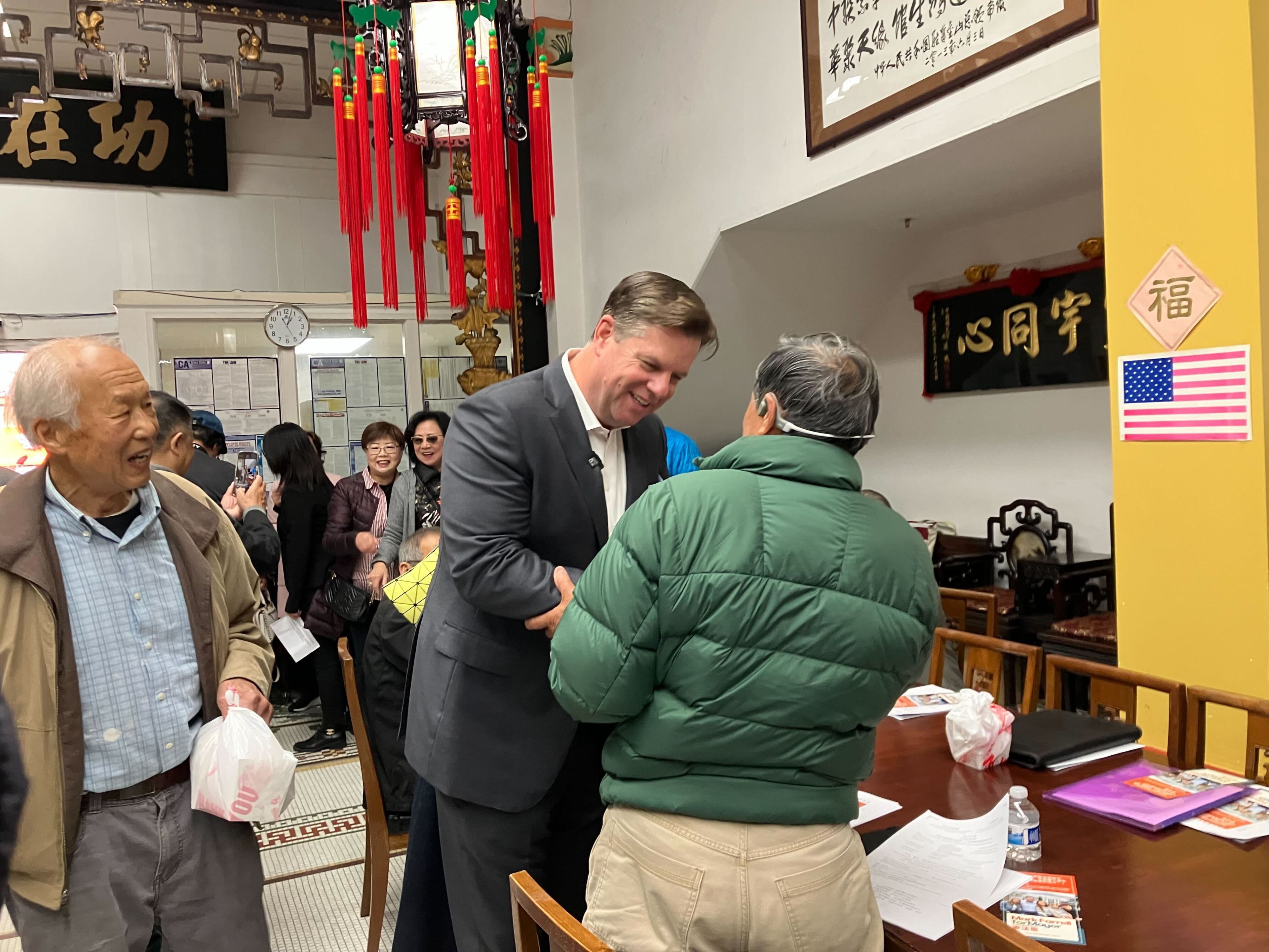Ex-Mayor Mark Farrell speaks to Chinatown residents at the Chinese Consolidated Benevolent Association of America on Saturday, March 30, 2024.