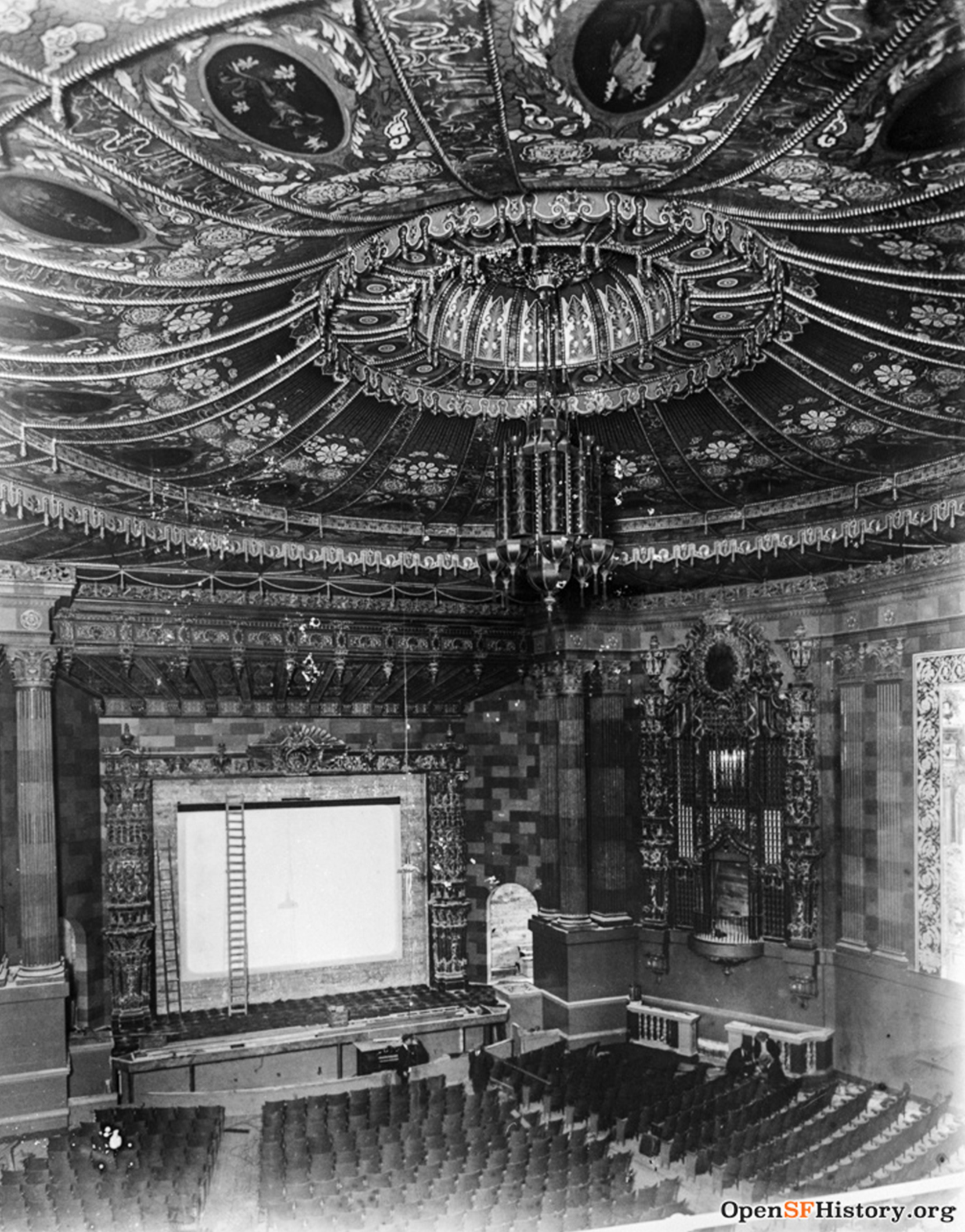 a black-and-white archival shot of a movie theater interior