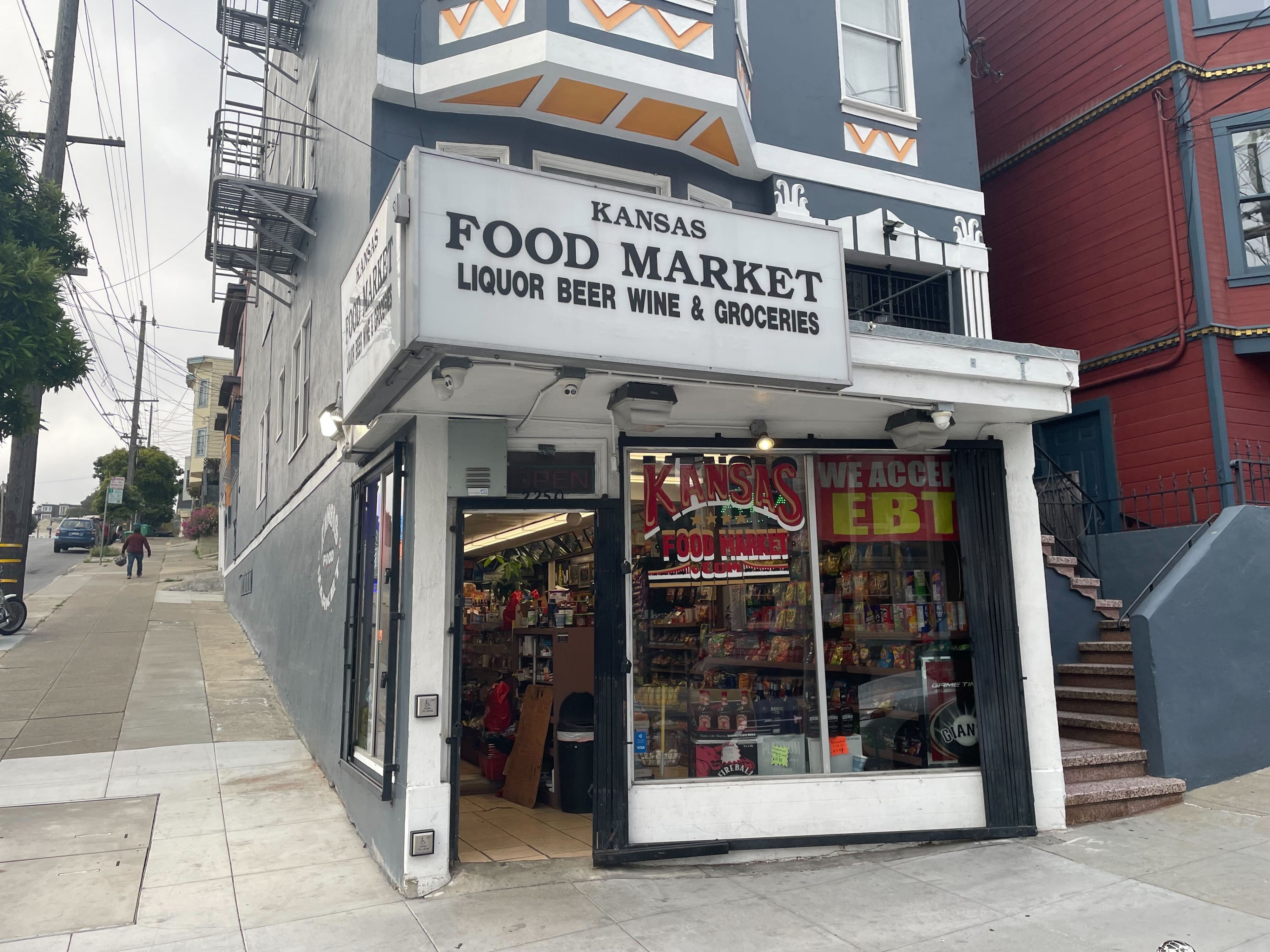 A corner store is seen in a photo.