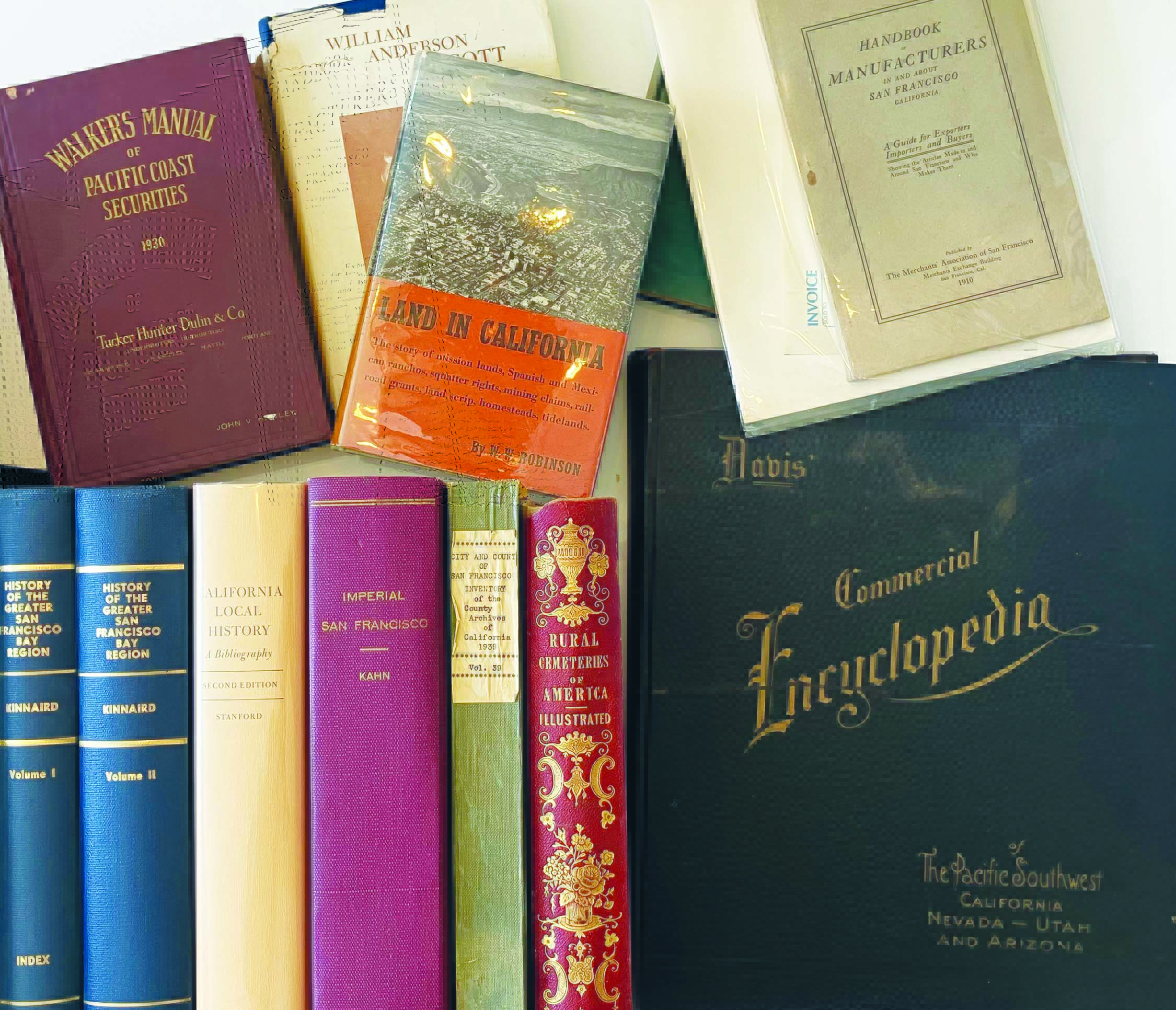 A collection of antique books, some with titles on Californian themes, history, and finance.