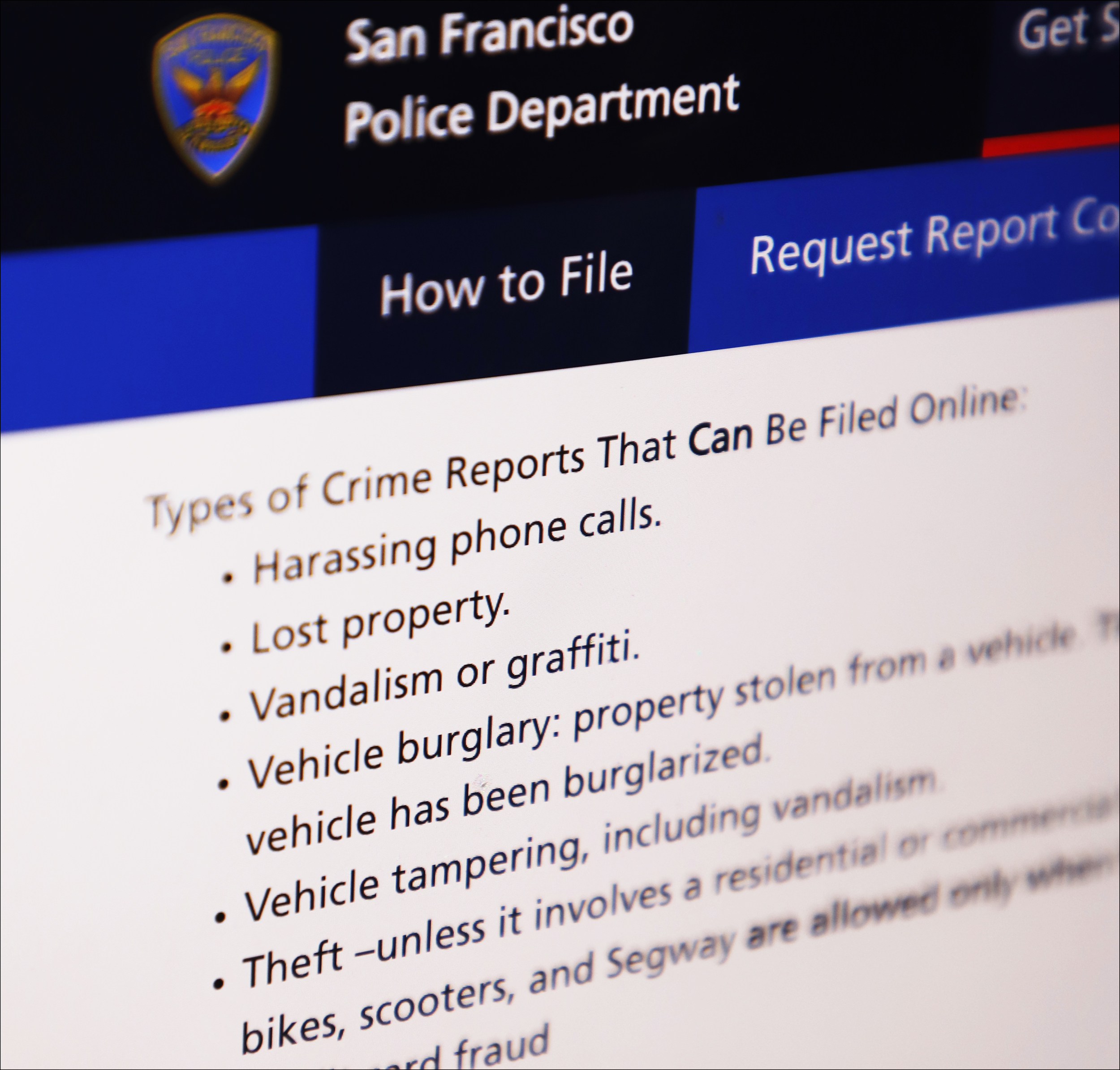 The image displays a webpage from the San Francisco Police Department detailing types of crime reports that can be filed online, such as harassing phone calls and lost property.