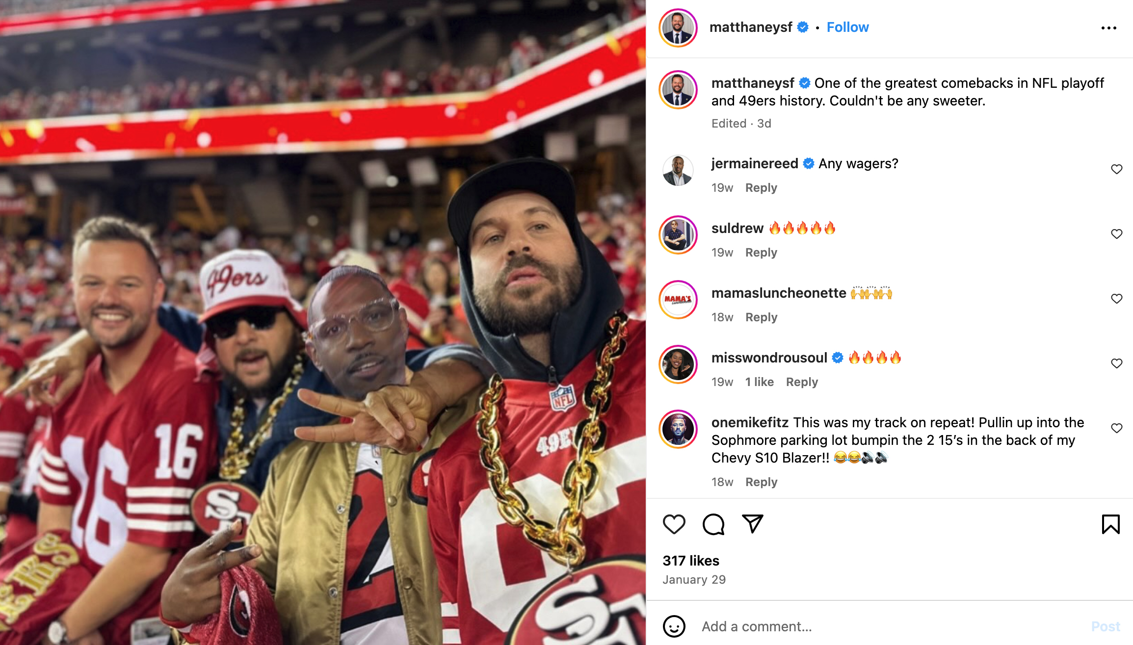 Four men dressed in San Francisco 49ers gear, including jerseys and hats, pose together in a stadium filled with cheering fans. They appear to be celebrating.