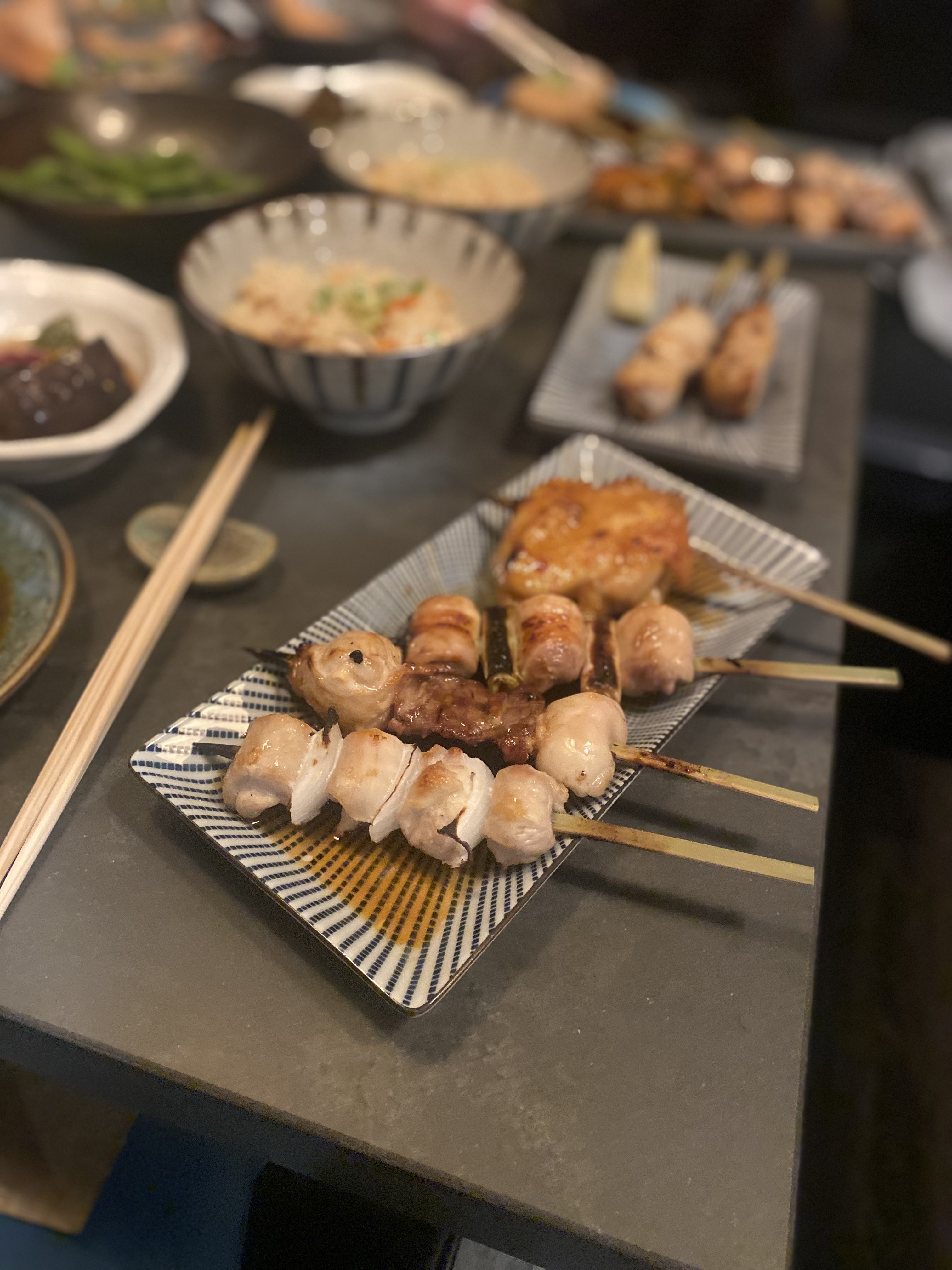 A plate of yakitori skewers.