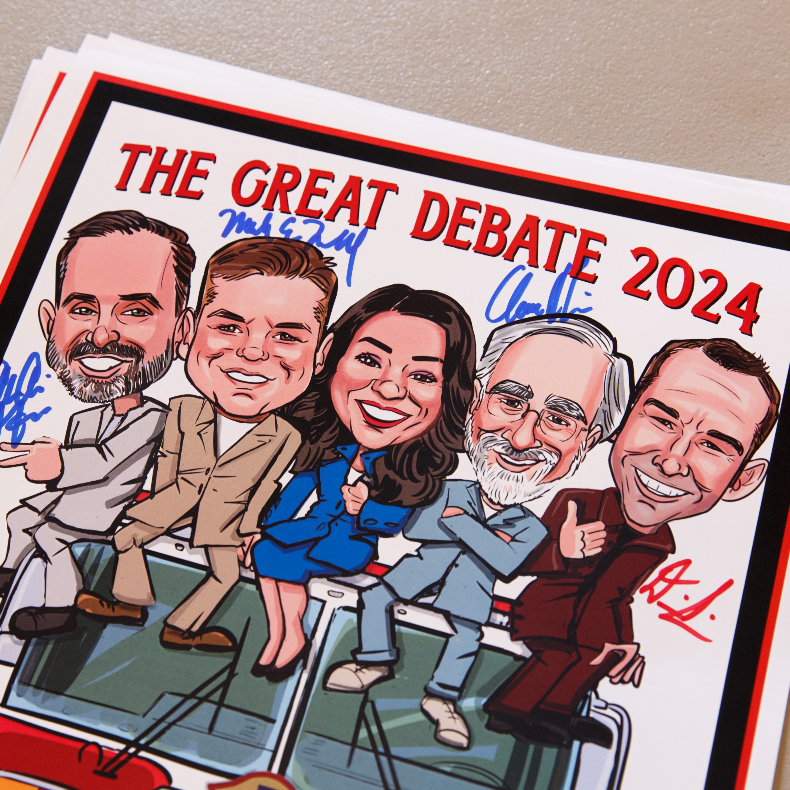 The image depicts a cartoonish drawing of five smiling people with signatures above them and red text saying &quot;The Great Debate 2024&quot; at the top.