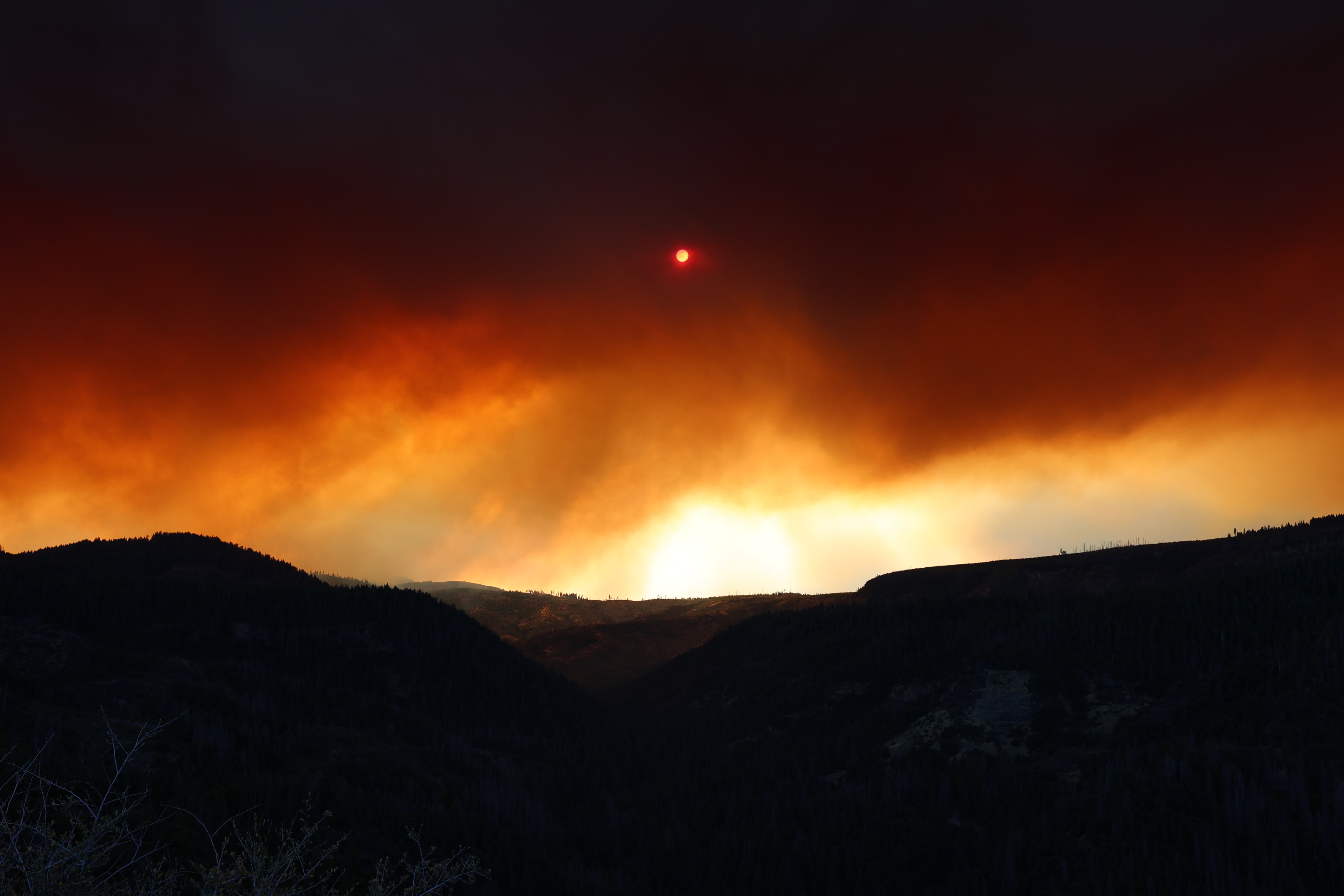 Sky clouded by smoke of a wildfire.