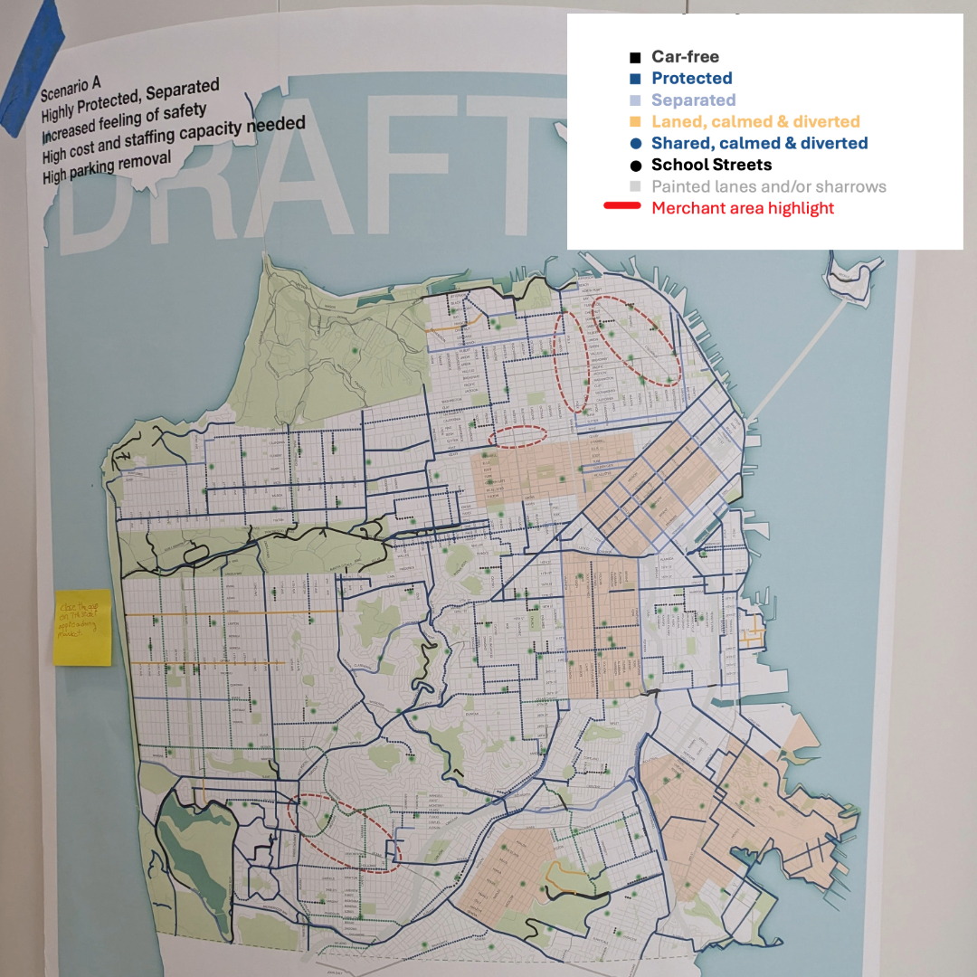 The image shows a draft map of a city with various streets marked in different colors and patterns indicating car-free areas, protected lanes, shared lanes, and merchant areas.