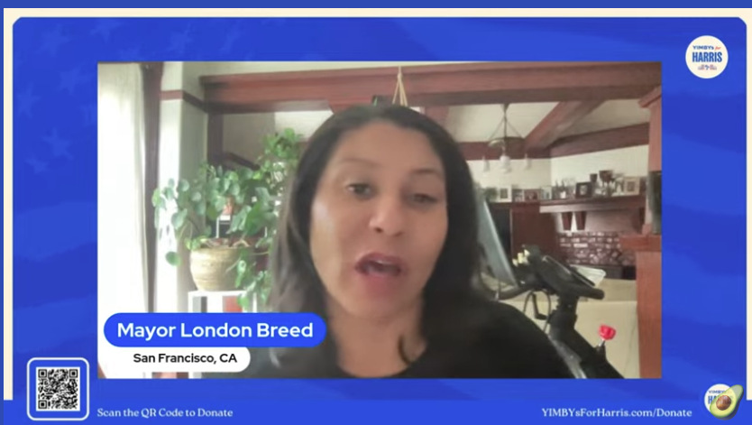 The image shows Mayor London Breed of San Francisco speaking in a video conference, with a blue frame around her and a QR code for donations at the bottom left.