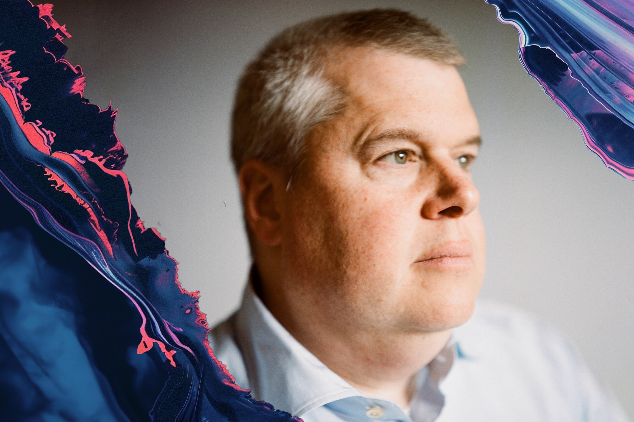 A man, Daniel Handler, with short gray hair and a serious expression is shown in partial profile against a gray background, with abstract colorful designs framing the image's edges.