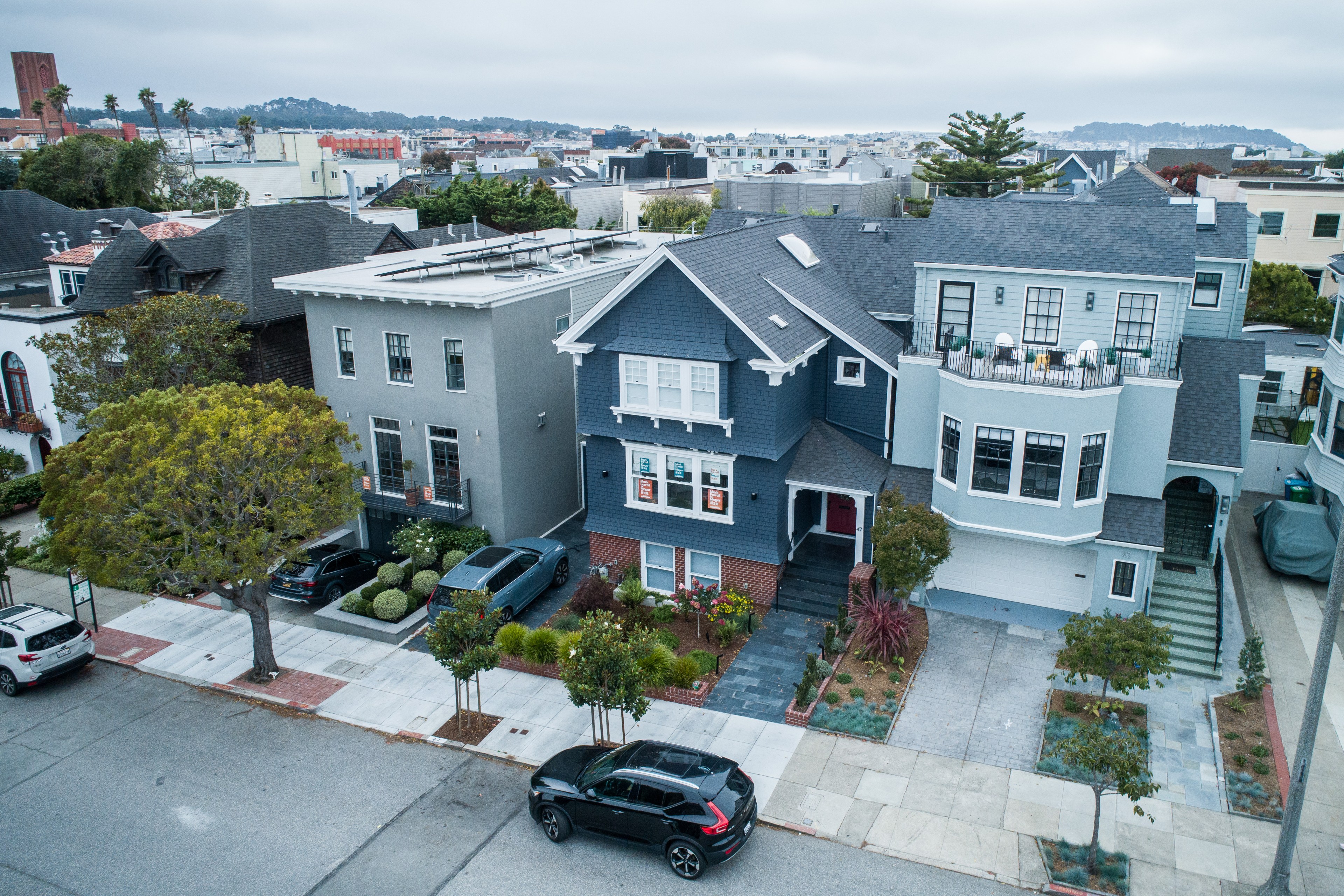 A gray house seen on a San Francisco street from an isometric view.