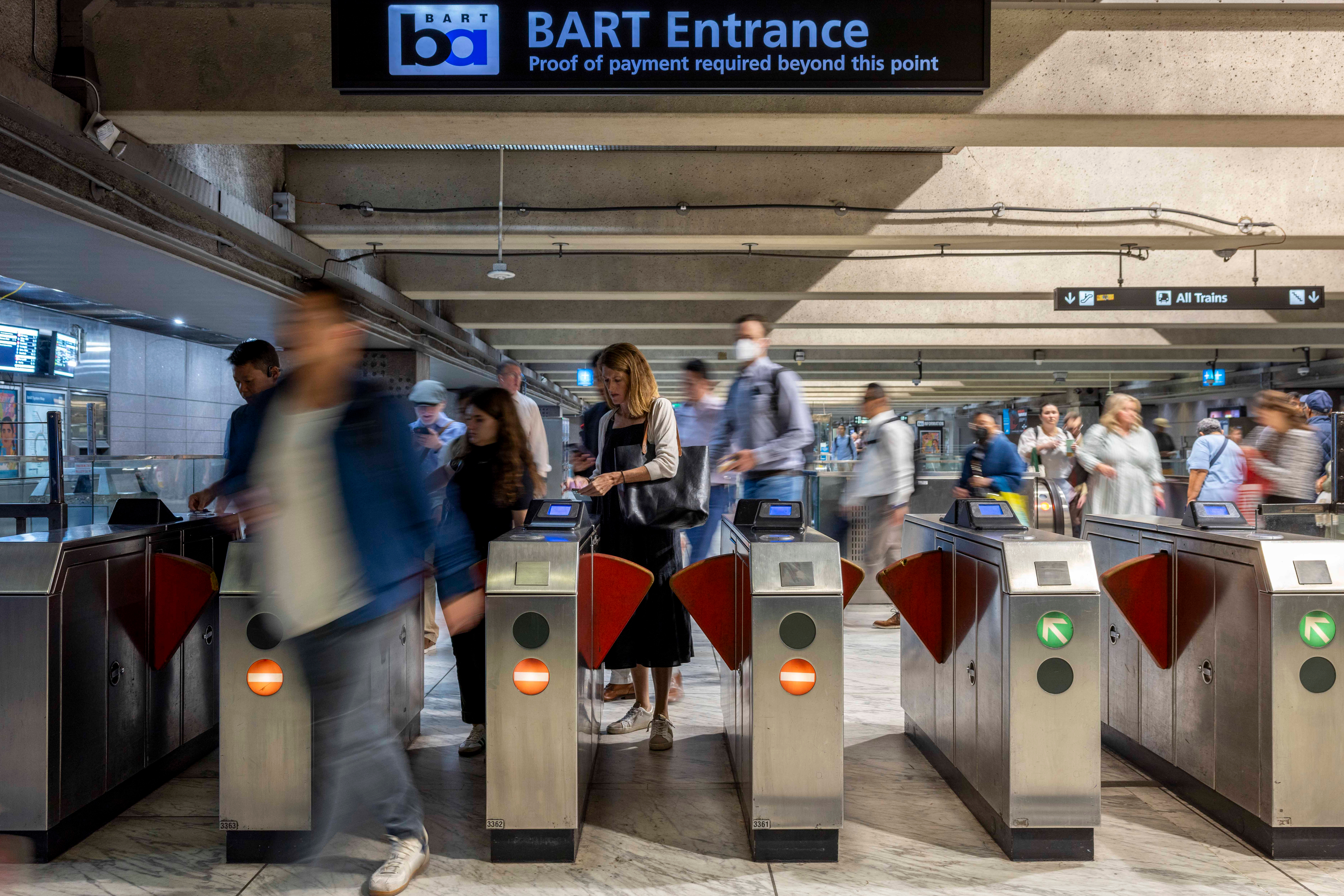 People exit the Embarcadero BART station in San Francisco.