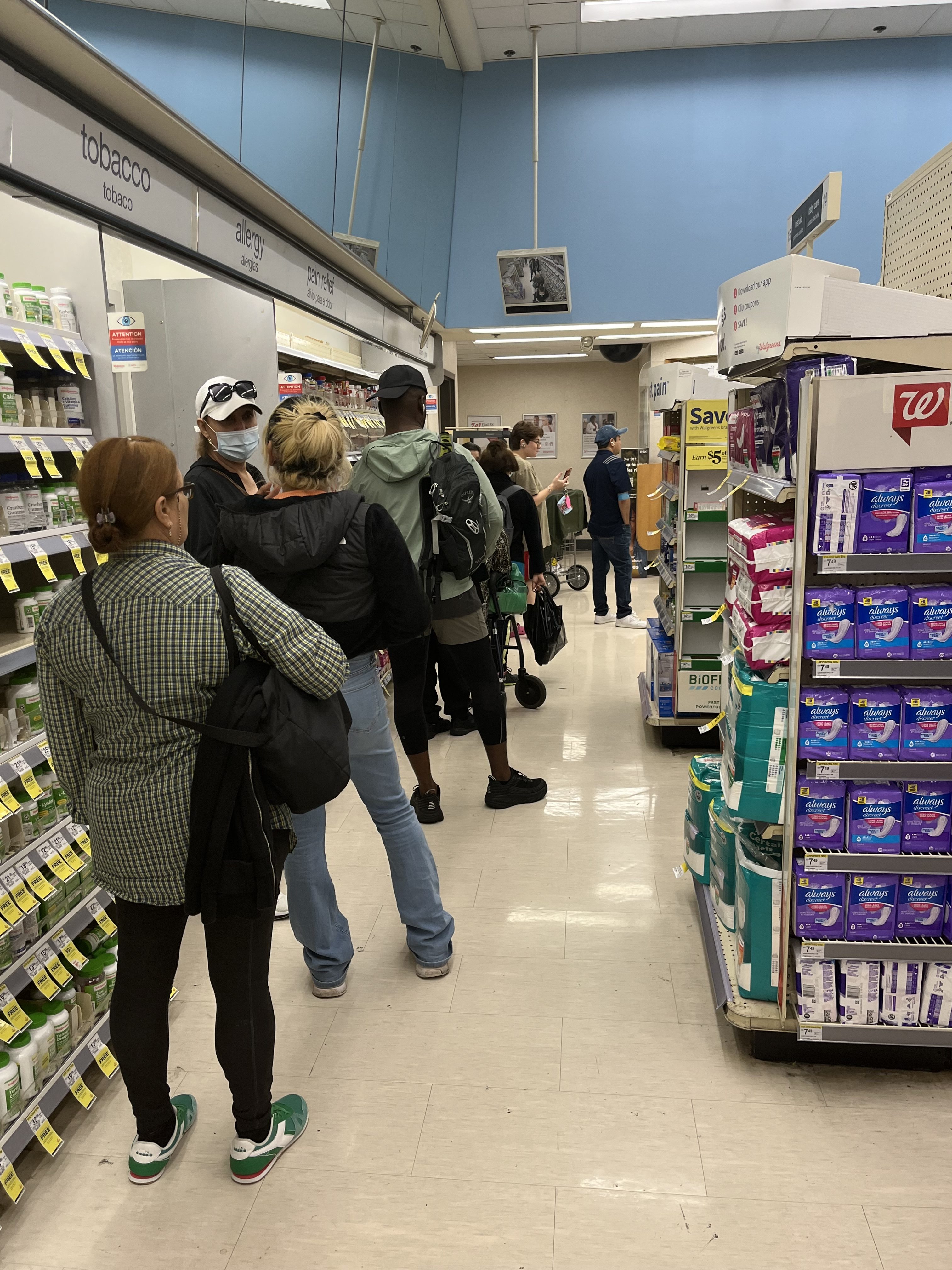 Long lines at Walgreens in the Mission on Tuesday, Oct. 15, 2024.