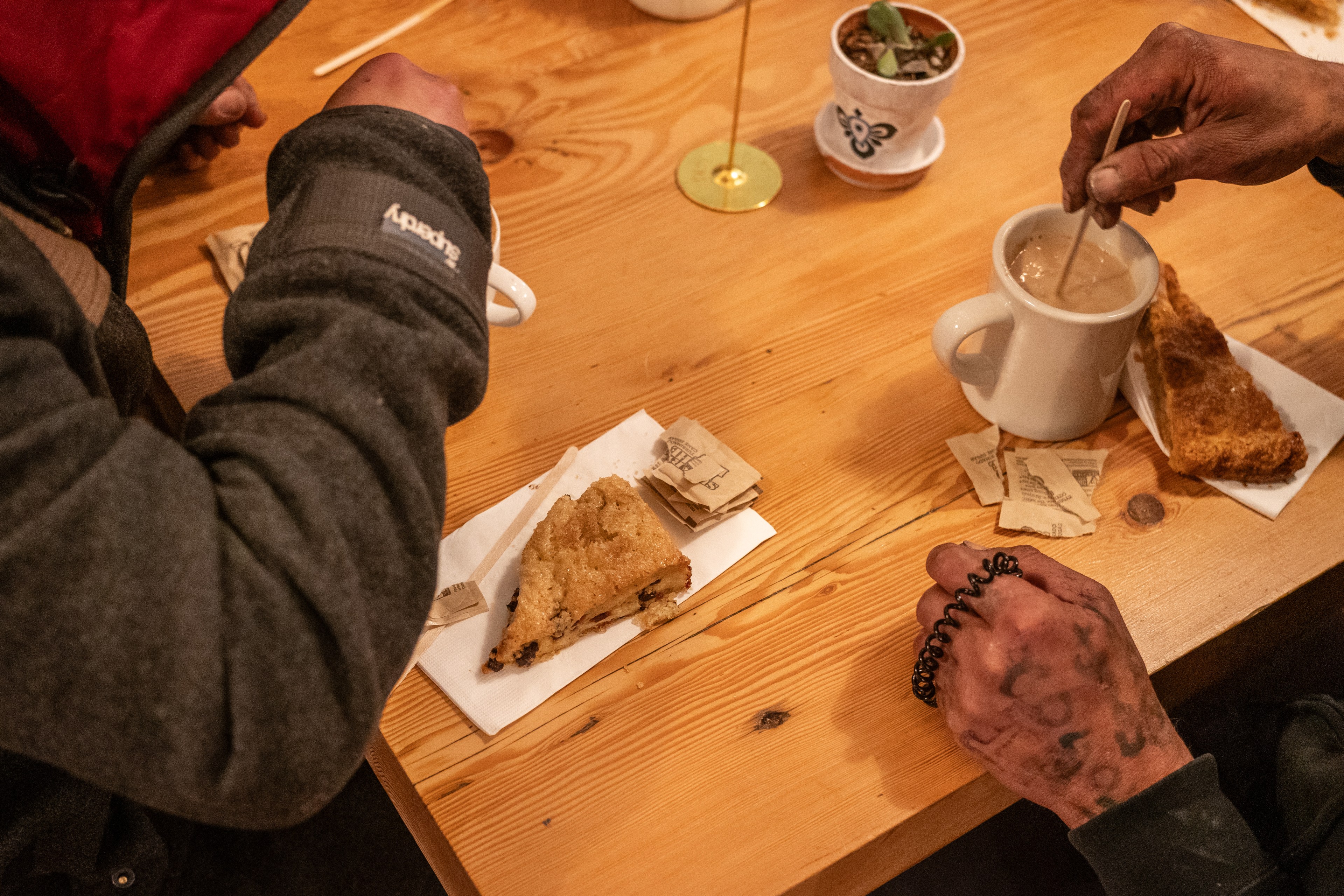 Patrons enjoy breakfast at the City Hope cafe in the Tenderloin District of San Francisco on Oct. 30, 2024. City Hope, a nonprofit, also operates a sober-housing hotel and community center.