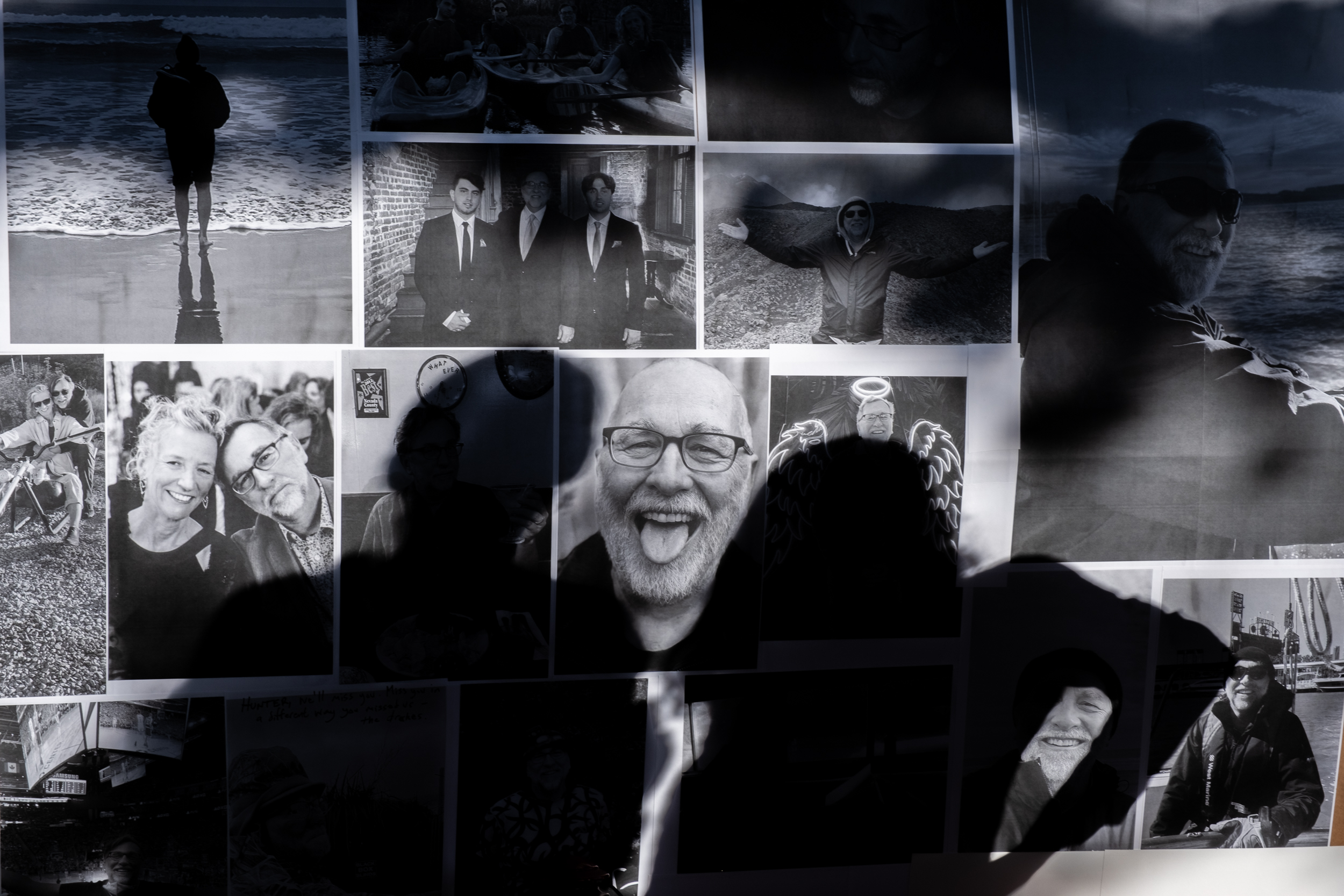 The image contains a collage of black and white photos featuring various people in different settings. Shadows partially obscure the pictures.