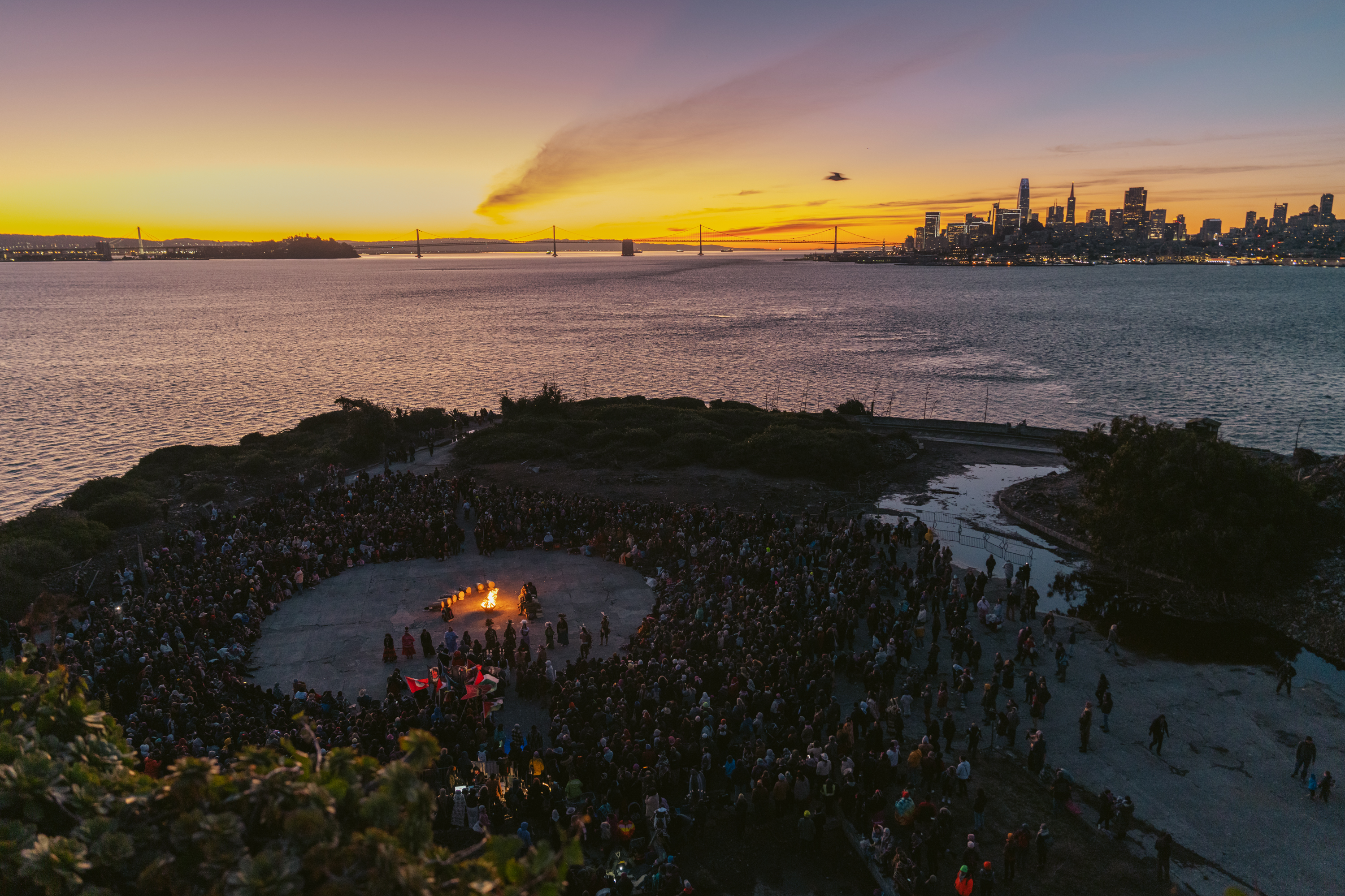 An overhead view of the indigenous sunrise gathering on Alcatraz Island