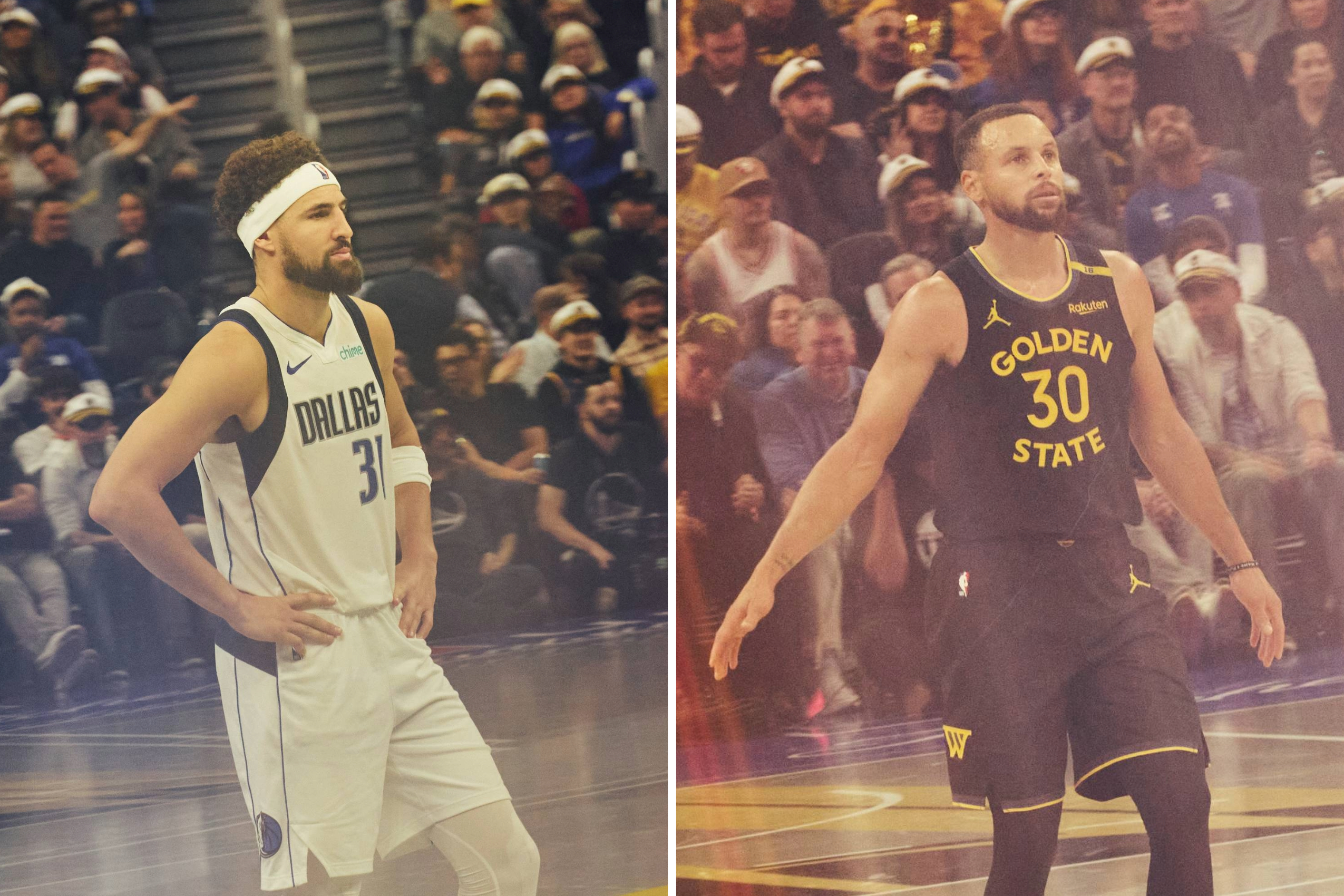 Two basketball players stand on the court. One wears a white Dallas jersey and headband. The other wears a black Golden State jersey. A crowd watches in the background.