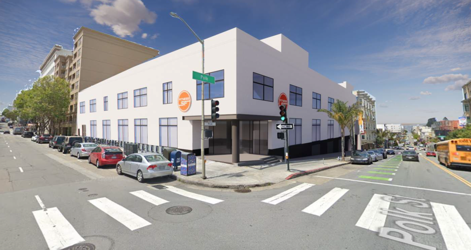 A modern, two-story building on a corner with large windows and &quot;Synthesis SF&quot; signage. It's at an intersection with crosswalks and a school bus nearby.