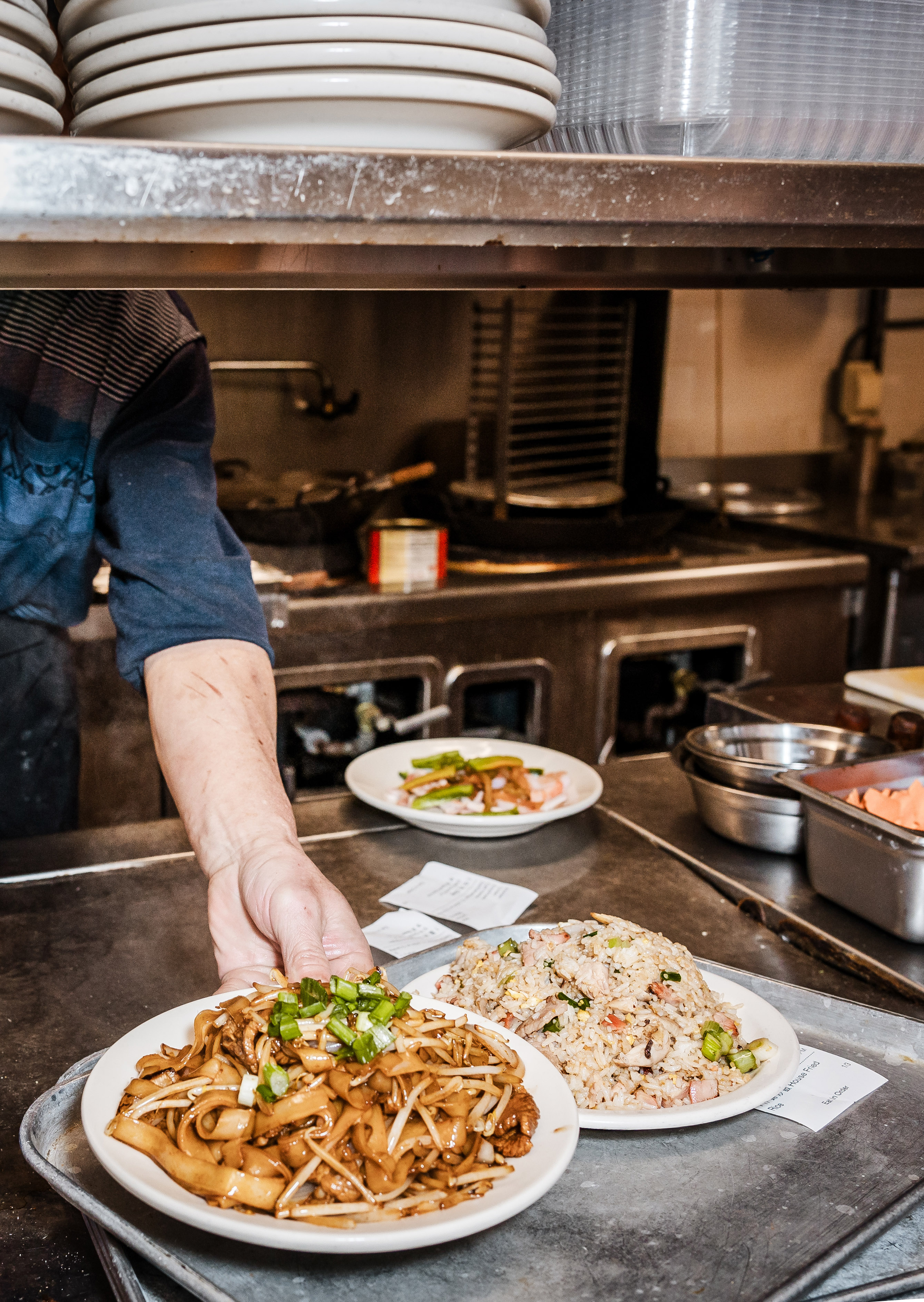 The kitchen has put up plates of Chinese-American food for over 100 years.