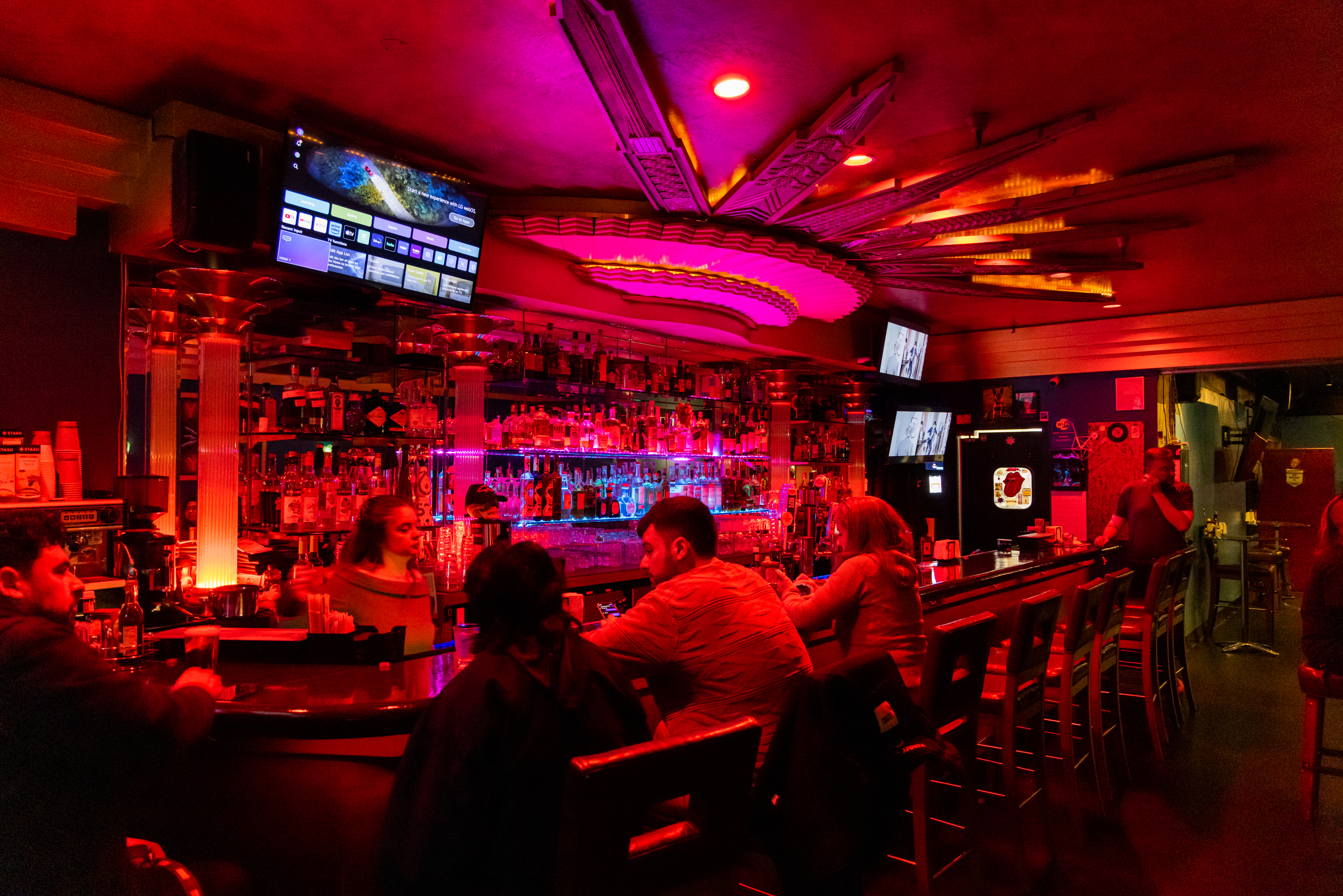 A photograph of a crowded bar.