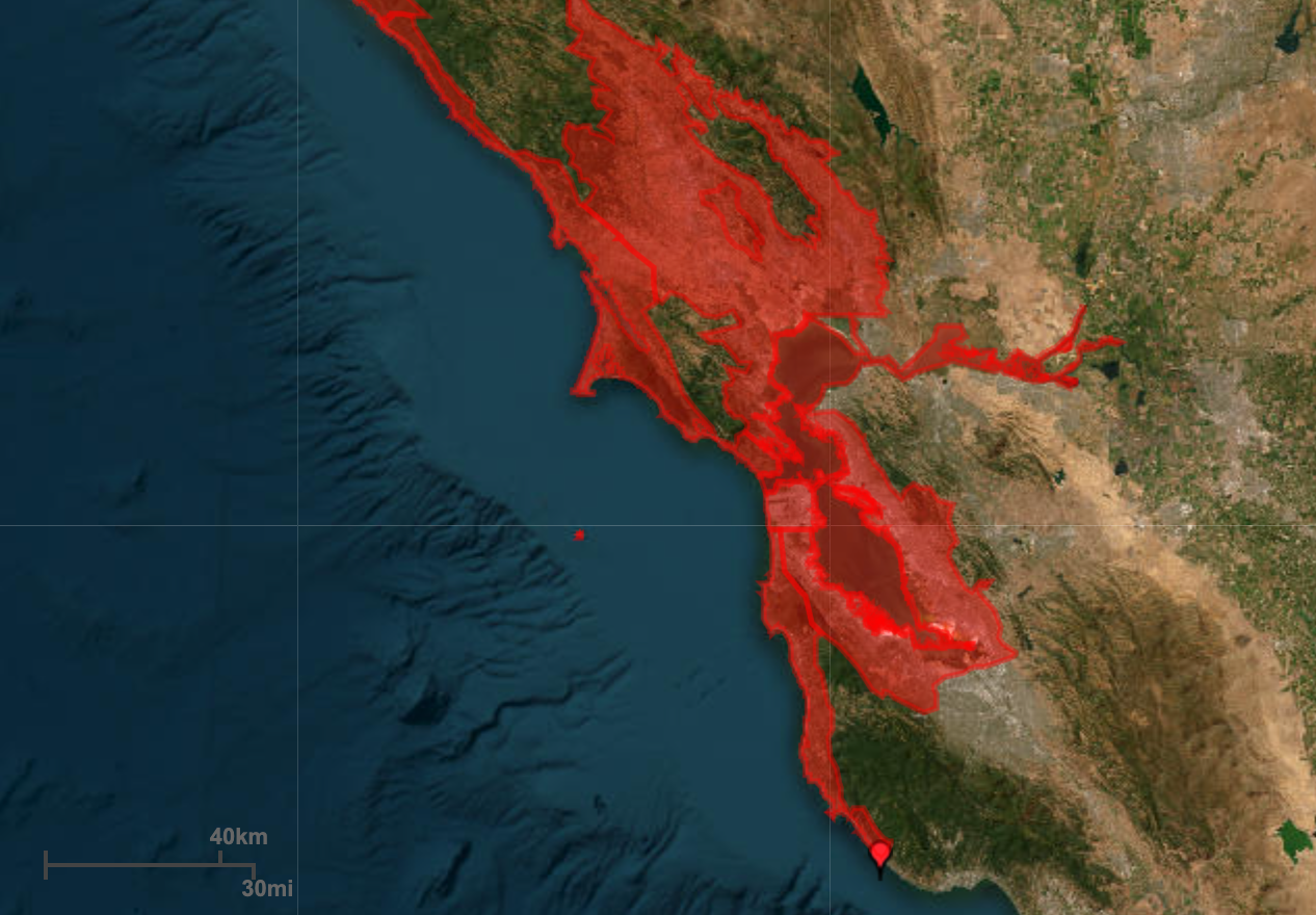 The image shows a satellite view of a coastline with red zones marked around urban areas, indicating a region at risk. There's an ocean on the left and land on the right.