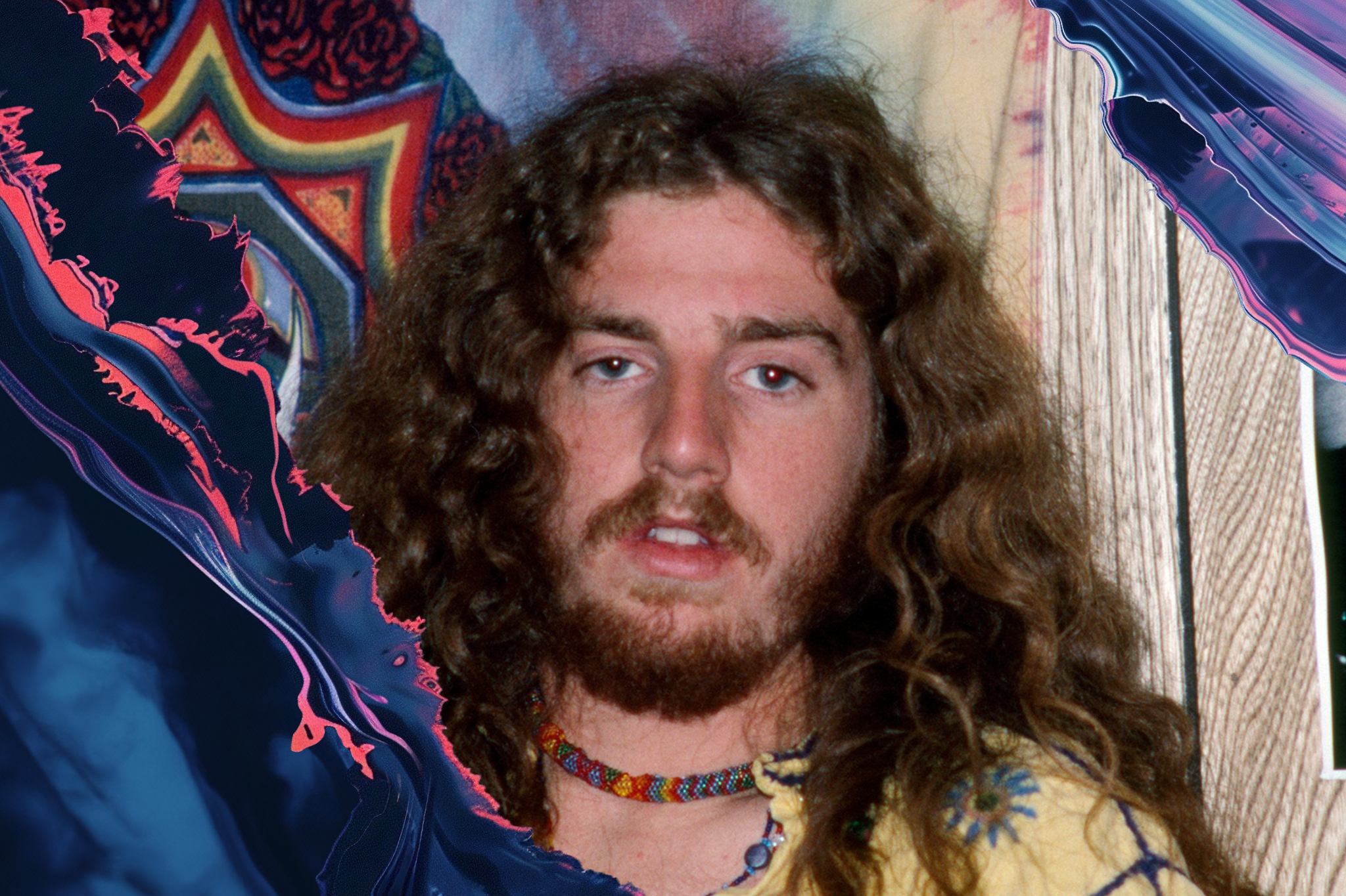 A person with long wavy hair and a beard is wearing a colorful beaded necklace. The background has vibrant, abstract patterns and a wooden texture.