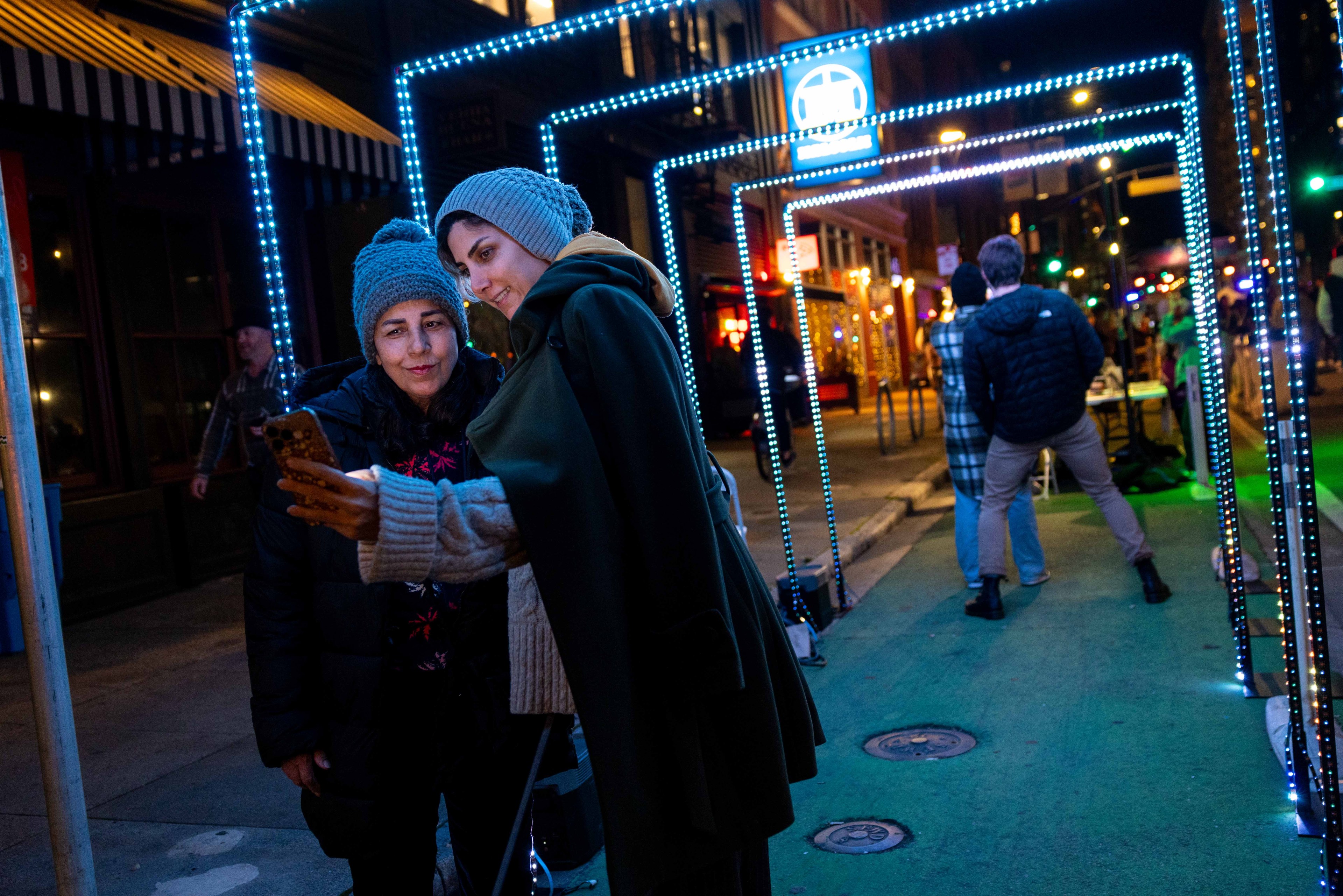 Two attendees snap a selfie