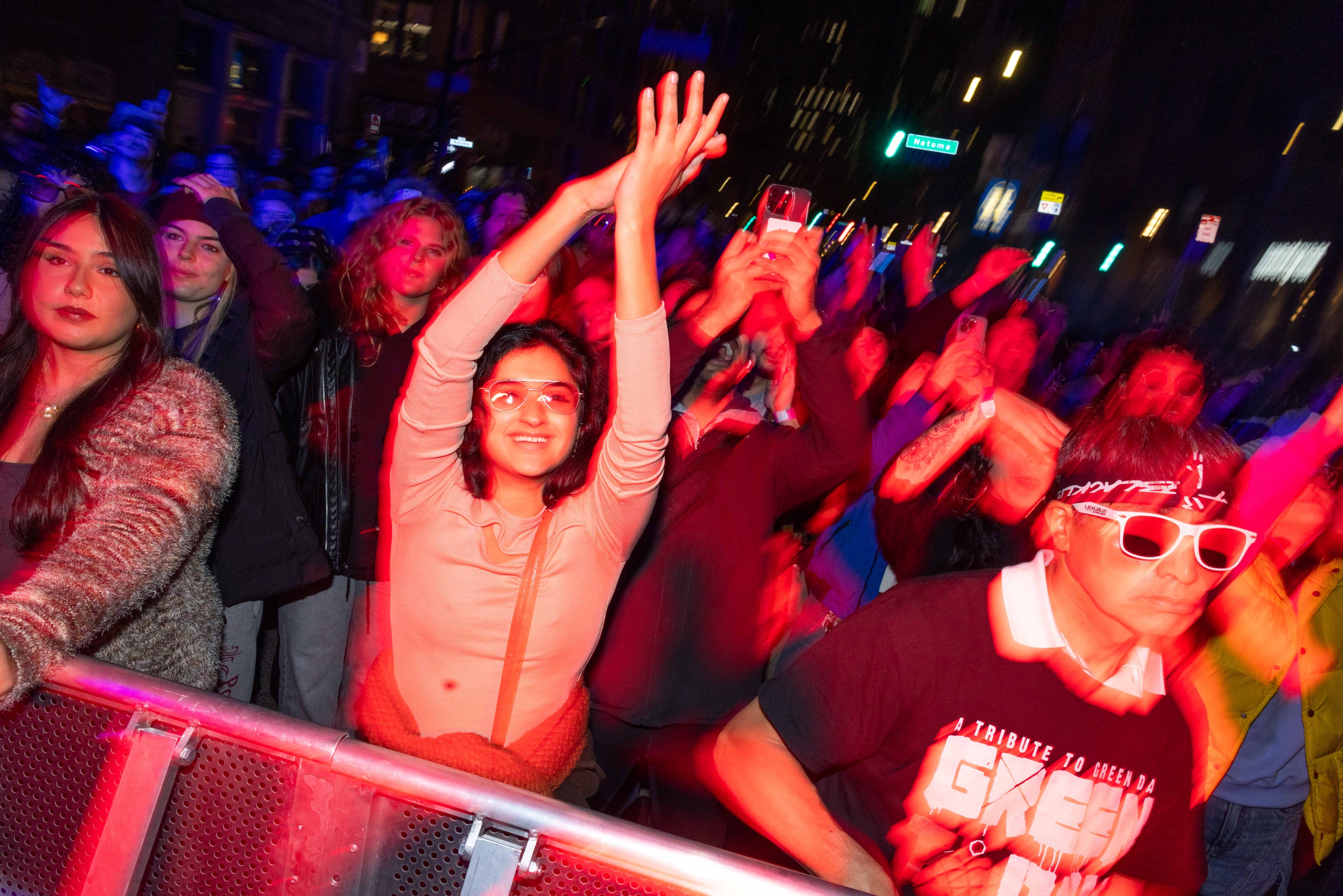 Attendees dance to the music