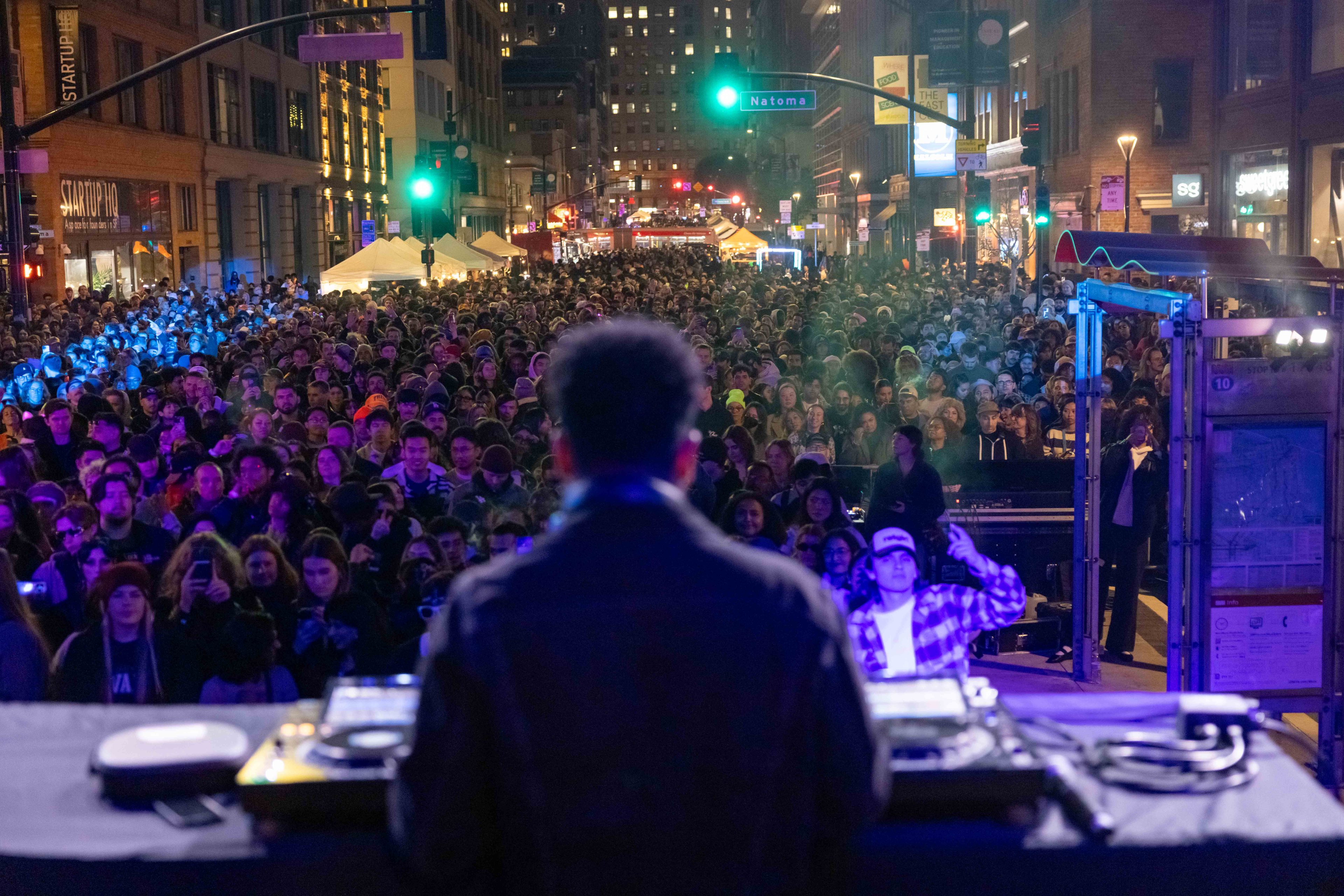 A shot from behind the DJ looking out at the crowd