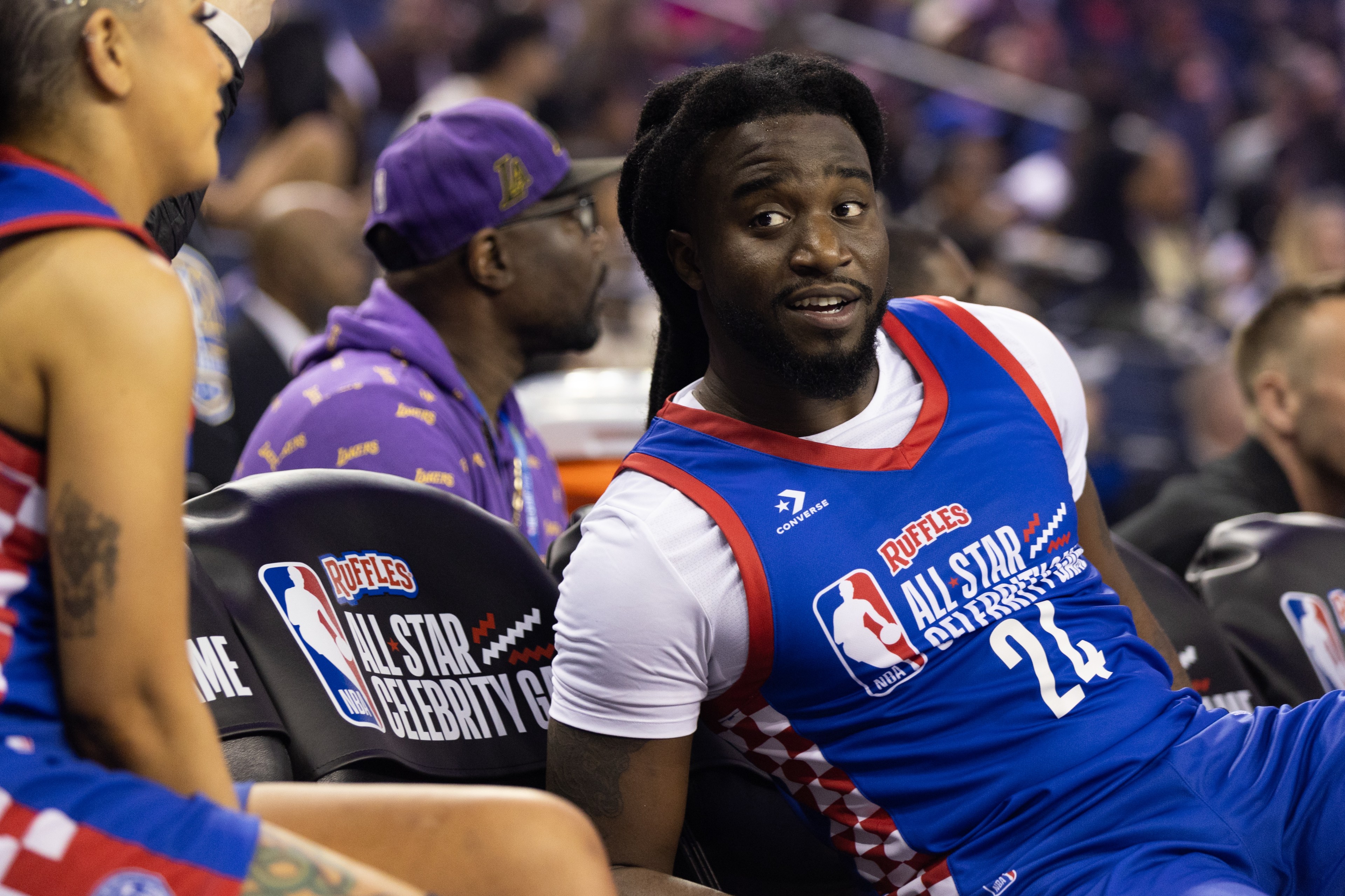 Shaboozey sits at the 2025 NBA All-Star Celebrity Game in Oakland, on Friday, Feb. 14, 2025. The Ruffles NBA All-Star Celebrity Game was hosted at Oakland Arena (formerly Oracle Arena) as part of the 2025 NBA All Start Weekend.