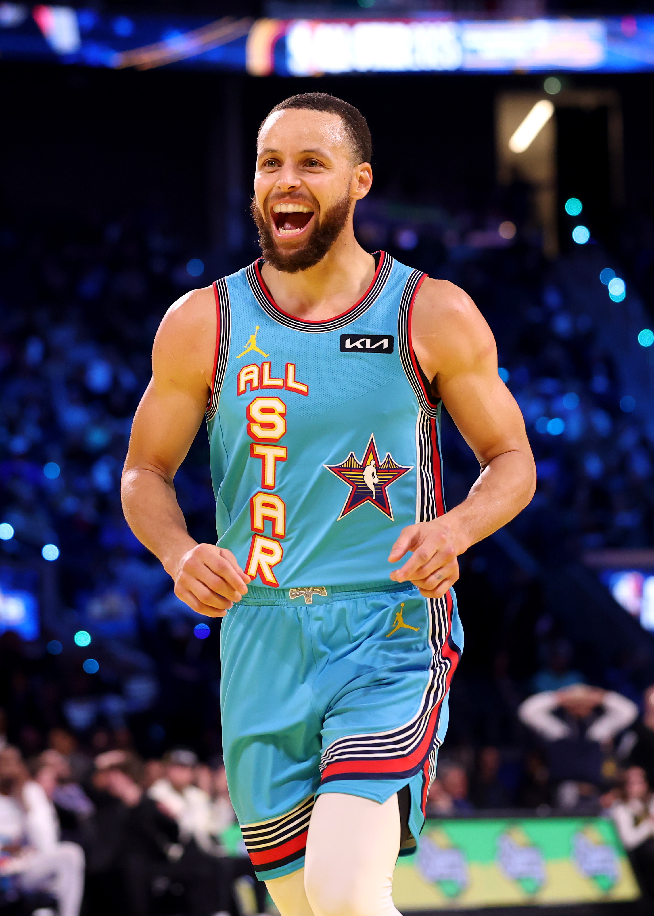 A basketball player smiling