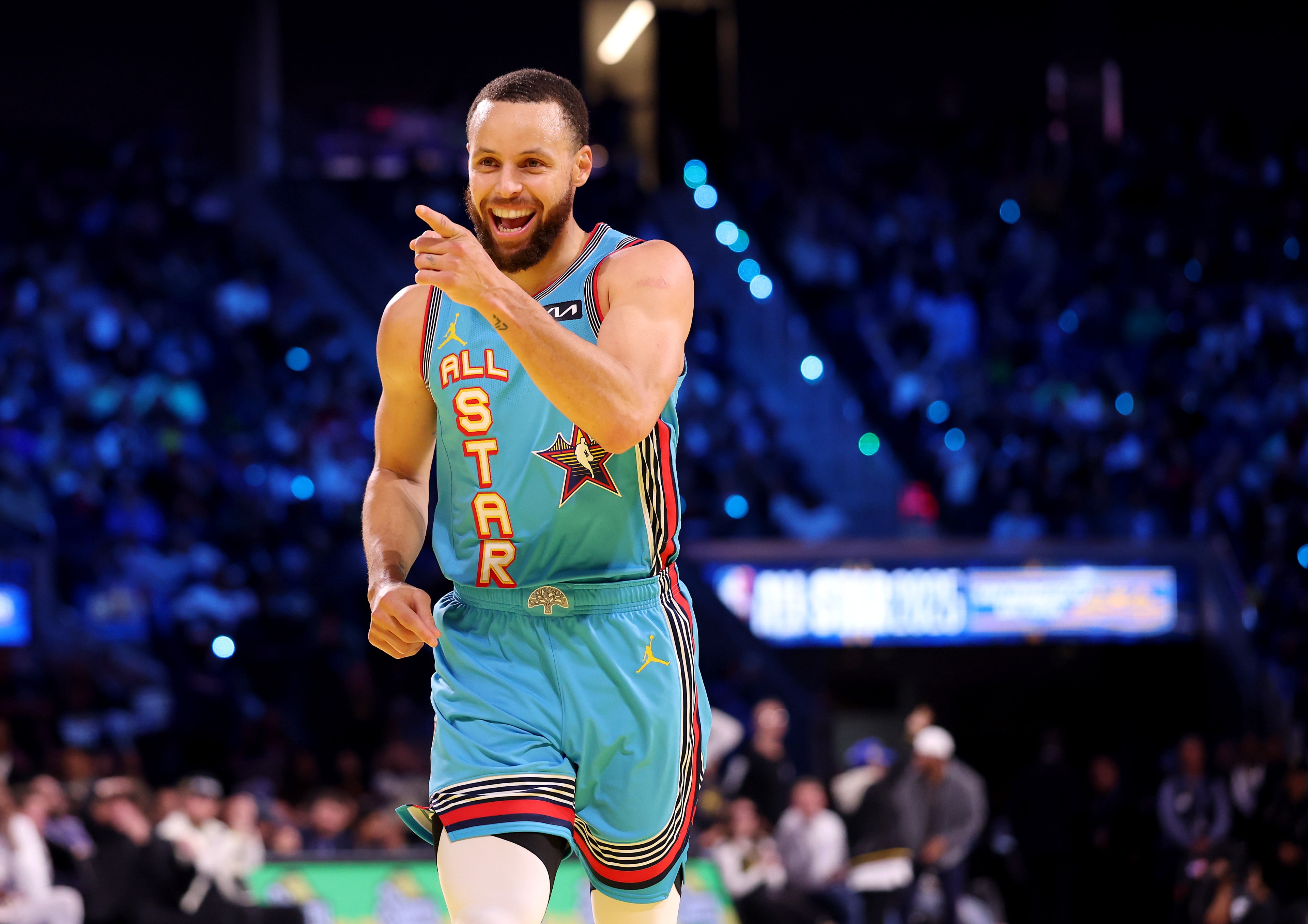 A basketball player running towards the camera