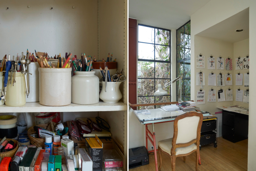 The image shows a creative workspace with jars of pencils and tools on shelves and a bright desk area with sketches on a wall and large windows nearby.