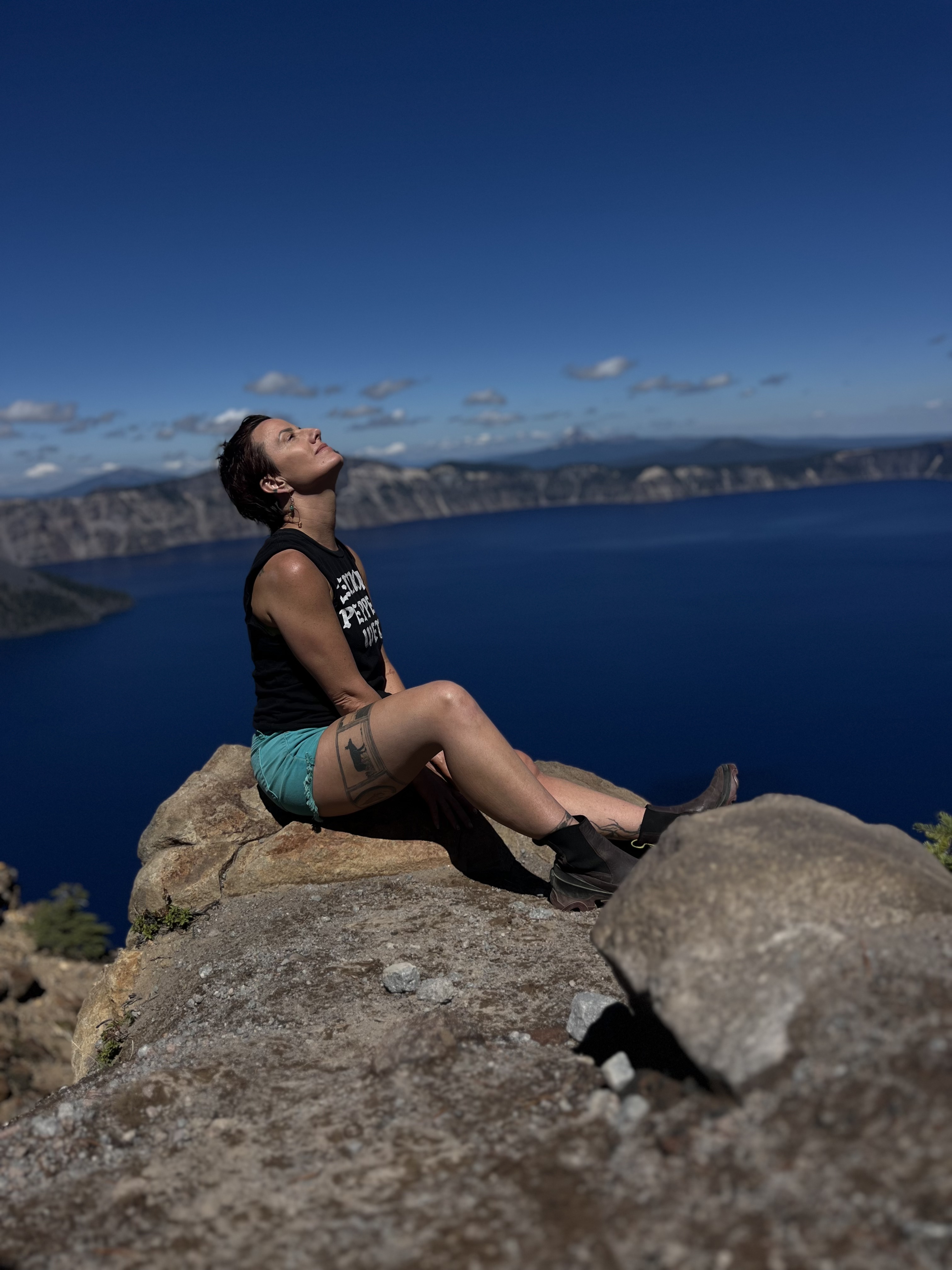 A photo of a woman basking in sunshine