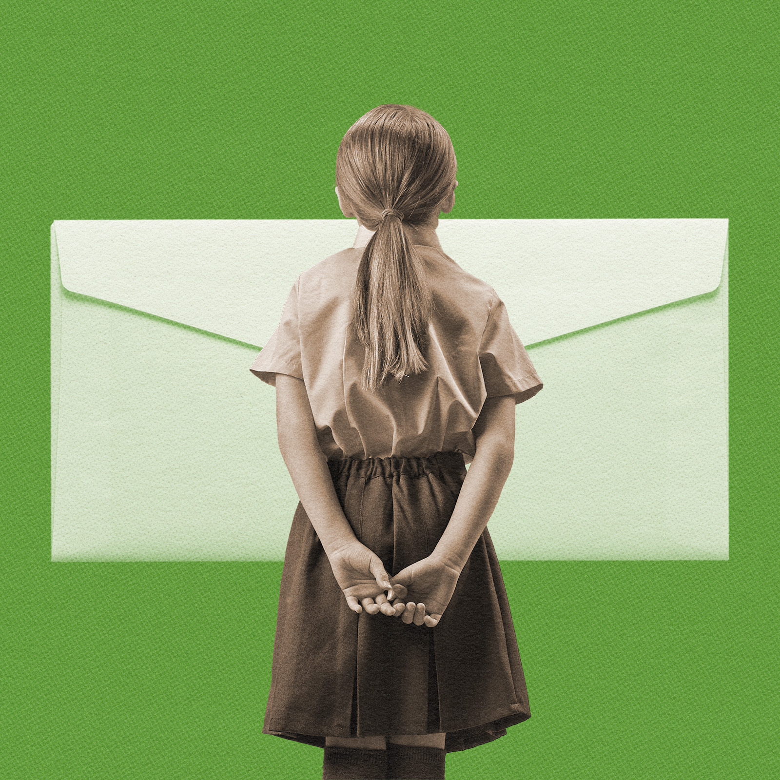A child looking at a letter