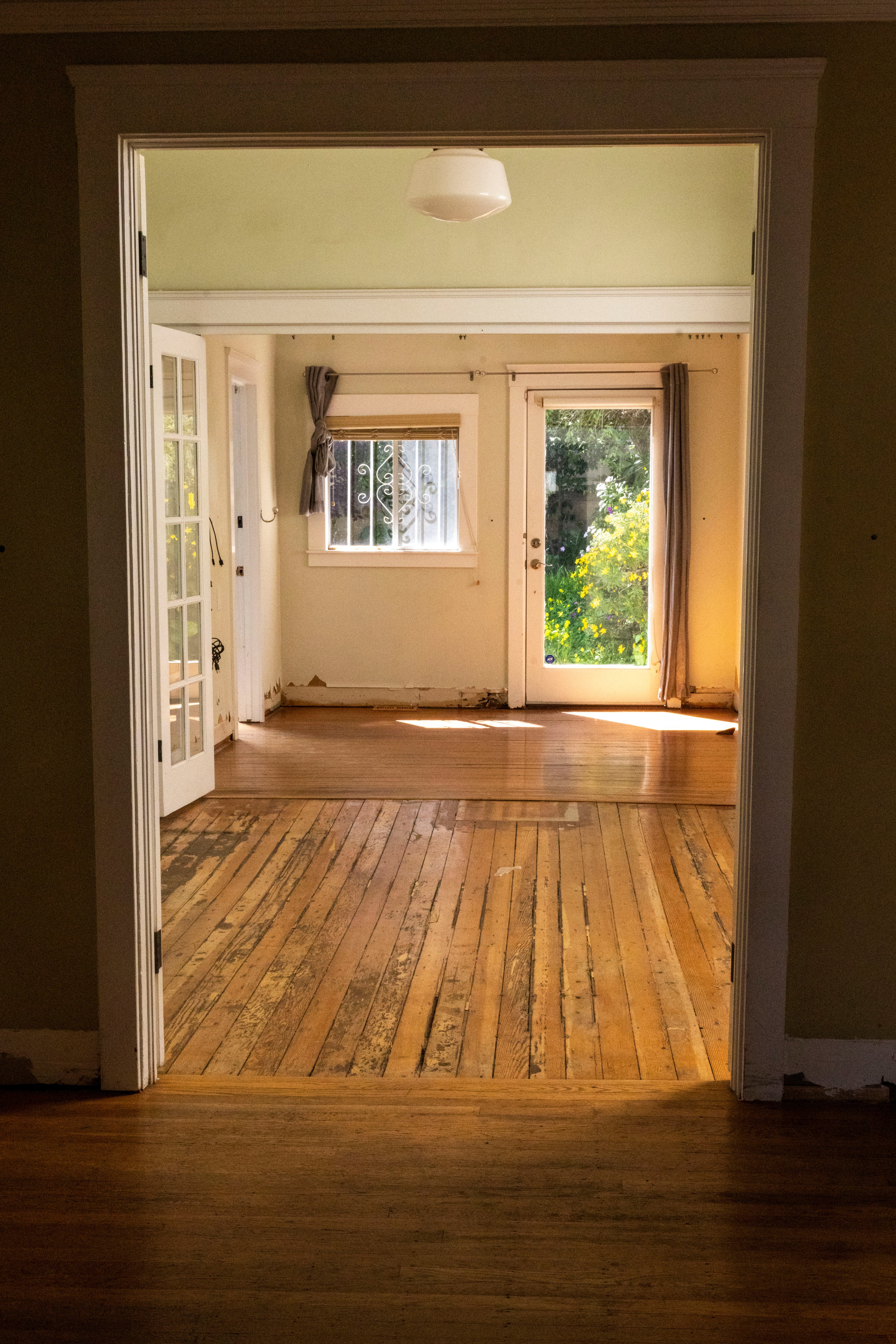 Two rooms of a Victorian home in the Castro with flooding damage.