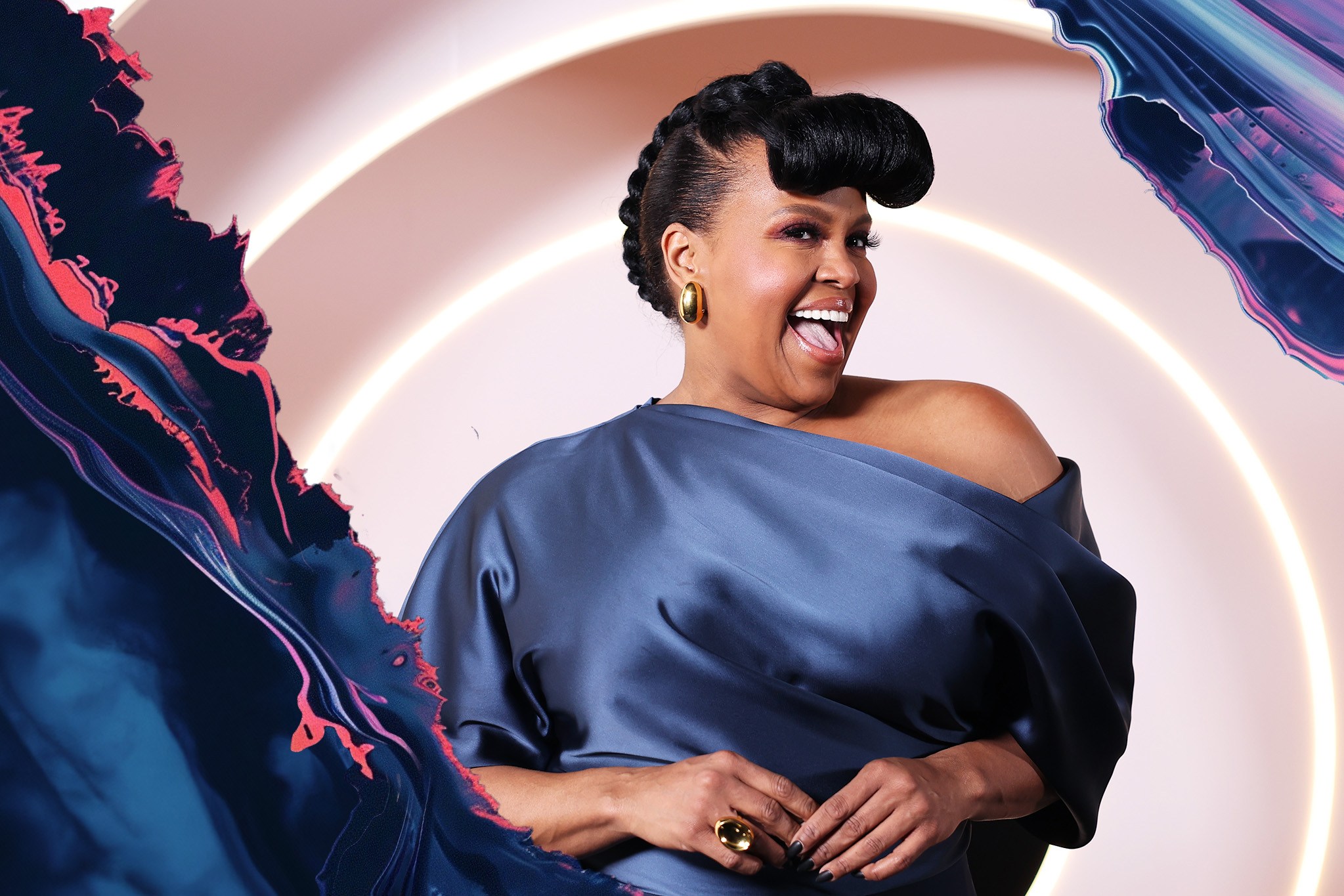 A woman, smiling brightly, wears a one-shoulder blue satin dress, with bold earrings and rings. The background features abstract blue and pink swirls.