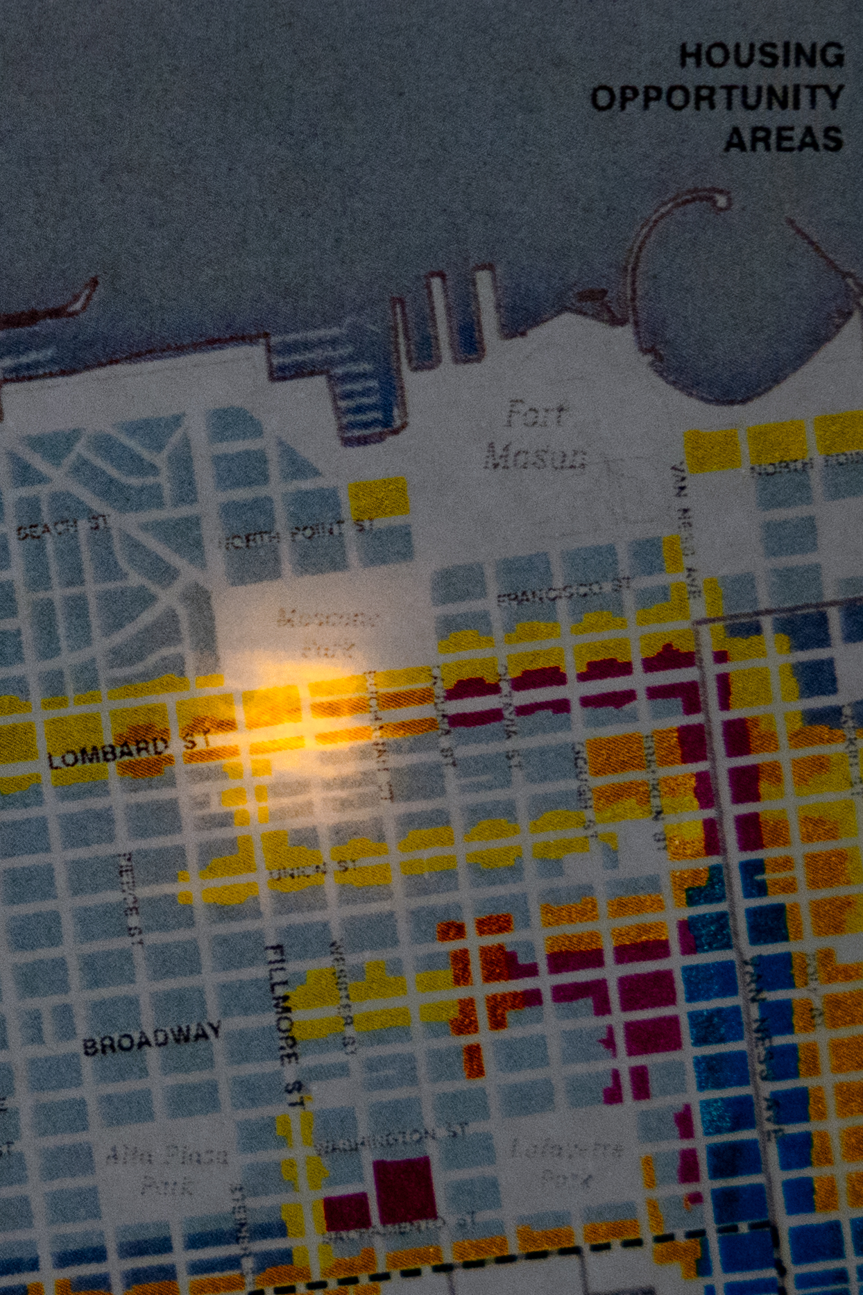 The image shows a section of a city map labeled &quot;Housing Opportunity Areas,&quot; with streets named and color-coded areas in blue, yellow, red, and pink.