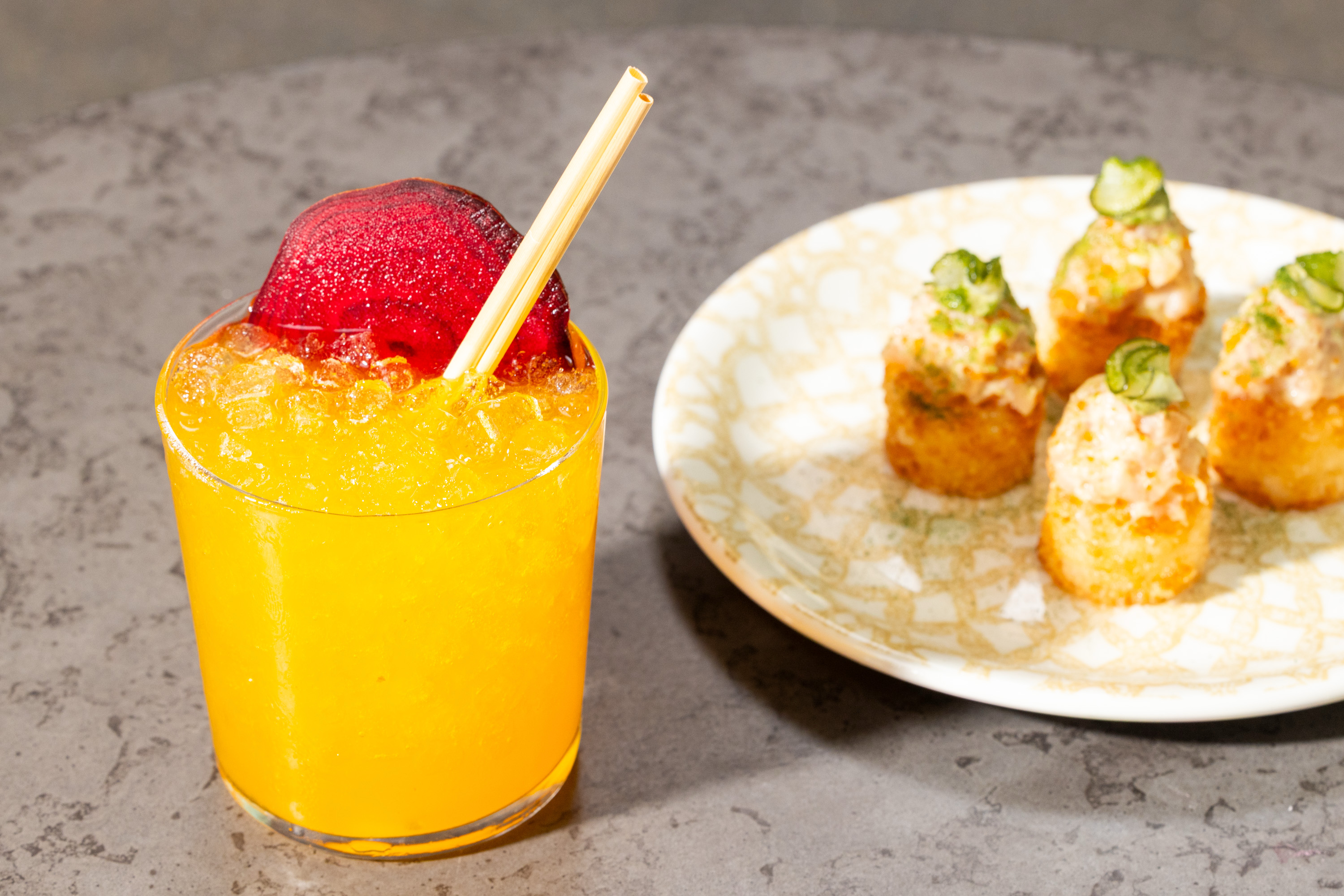 A Tam Tam cocktail and albacore tuna bite at Bar Darling